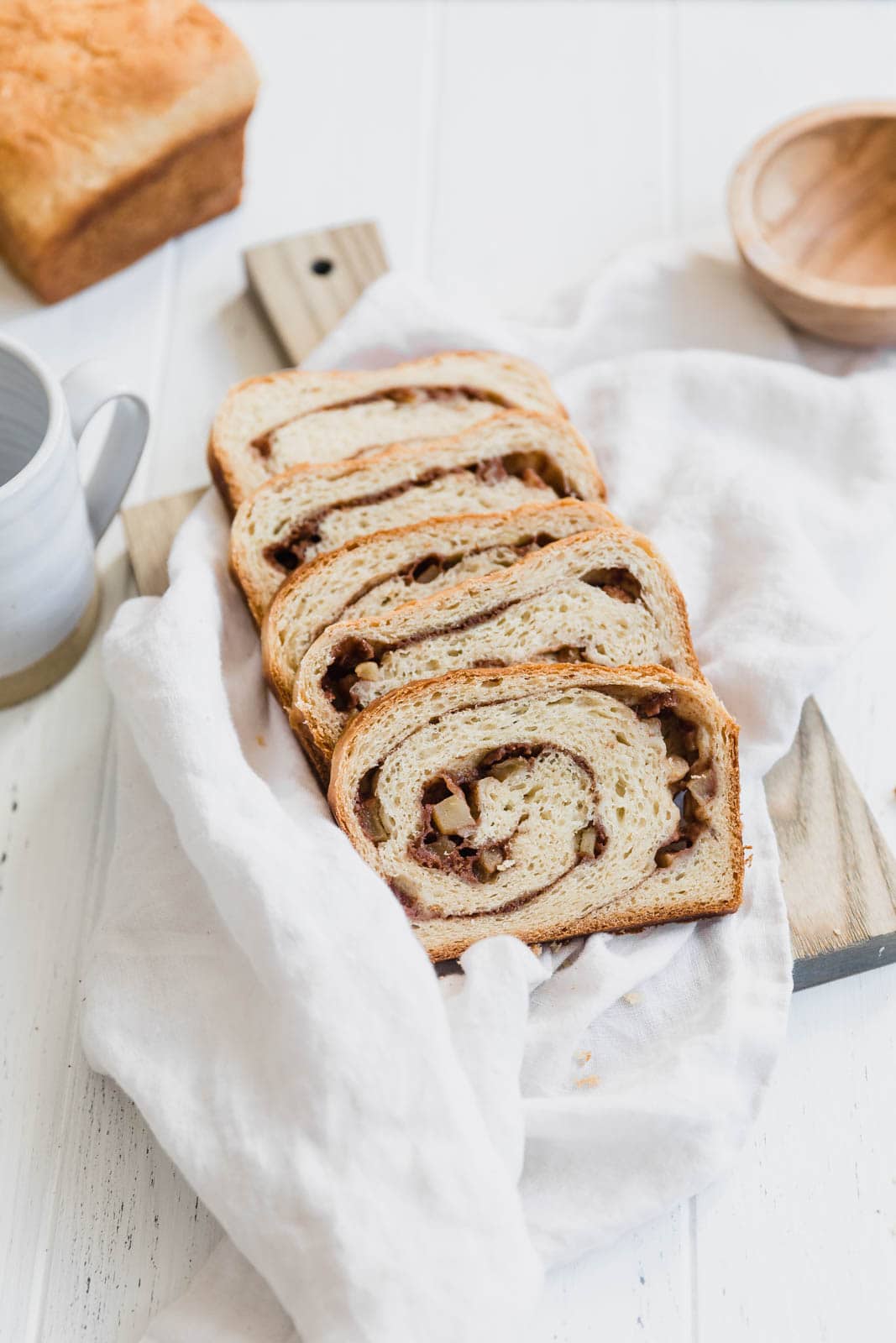 apple cinnamon bread slices on a towel