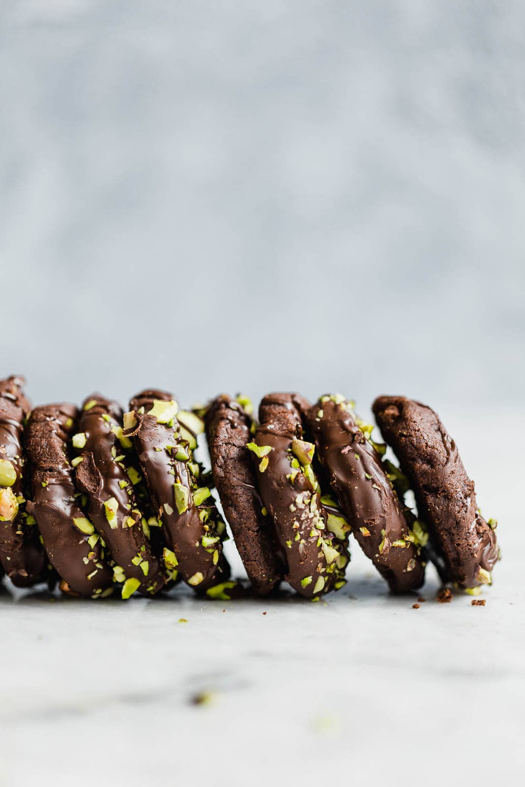 Chocolate Sable Cookies lined up on counter