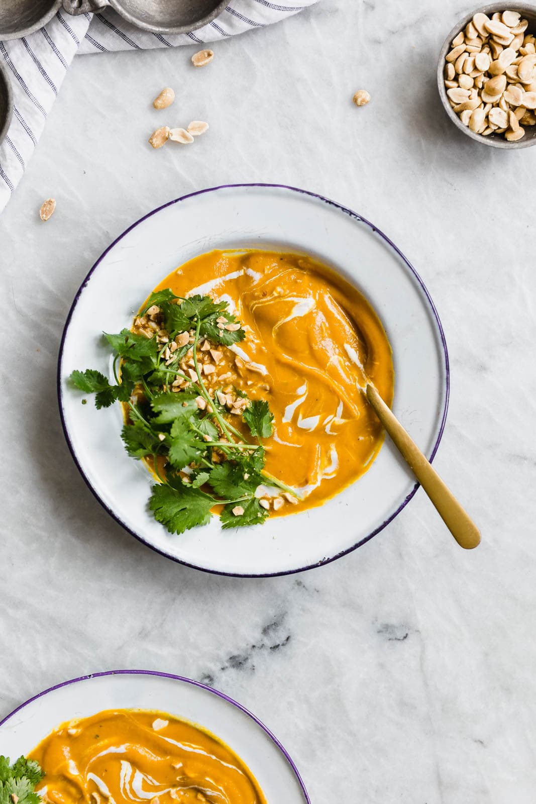 bowls of Vegan Turmeric Carrot Ginger Soup 