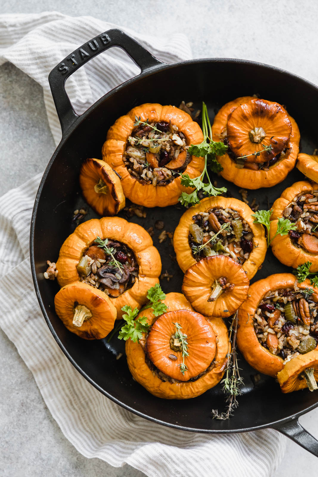 stuffed pumpkins in cast iron pan