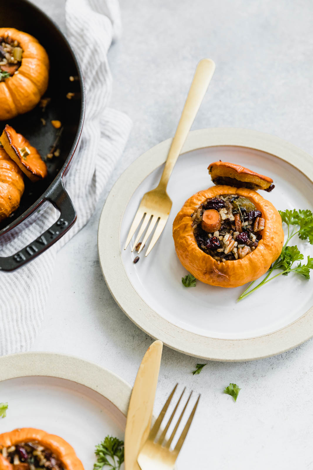 stuffed pumpkin on a plate with fork