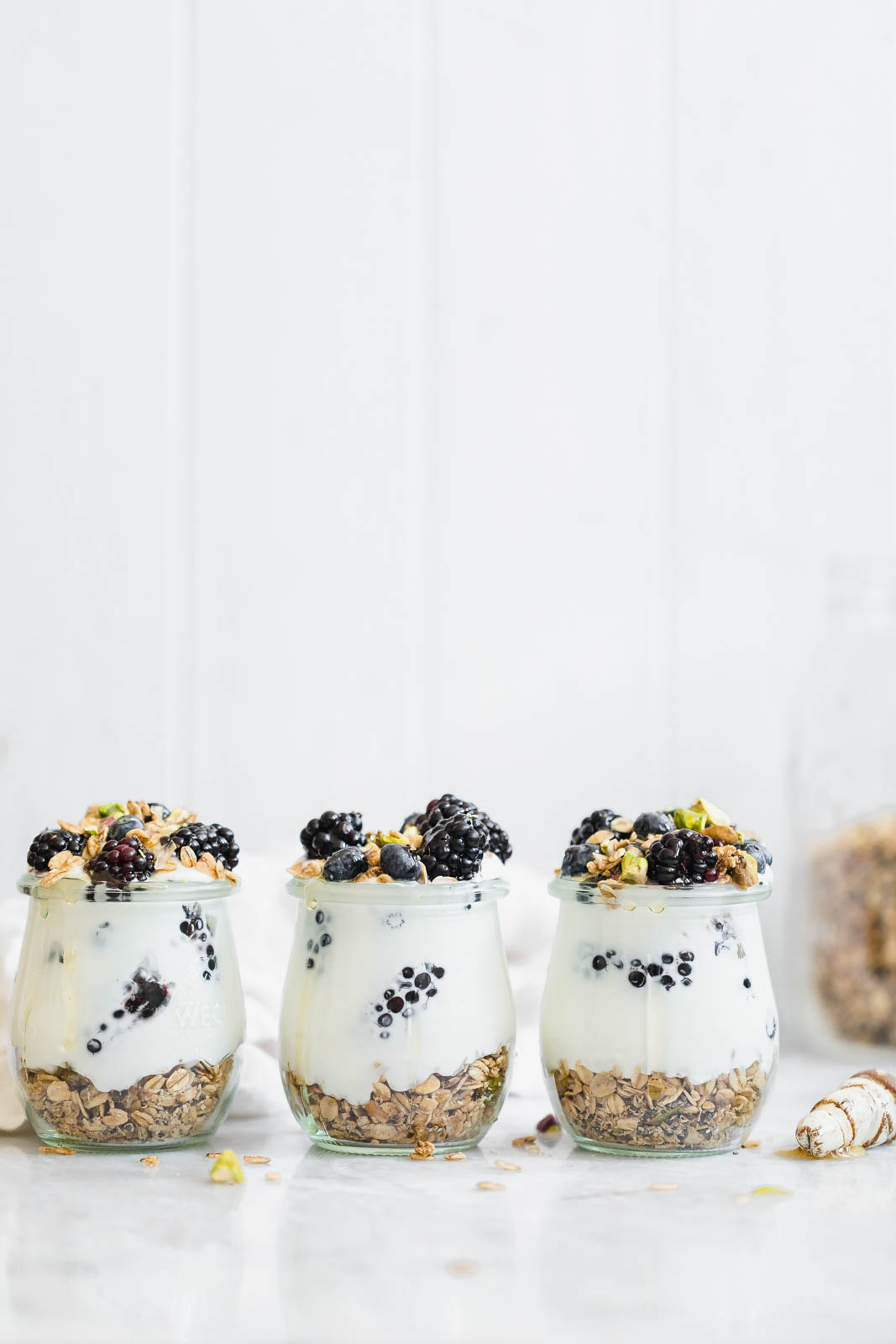 Cardamom Granola Parfaits topped with berries