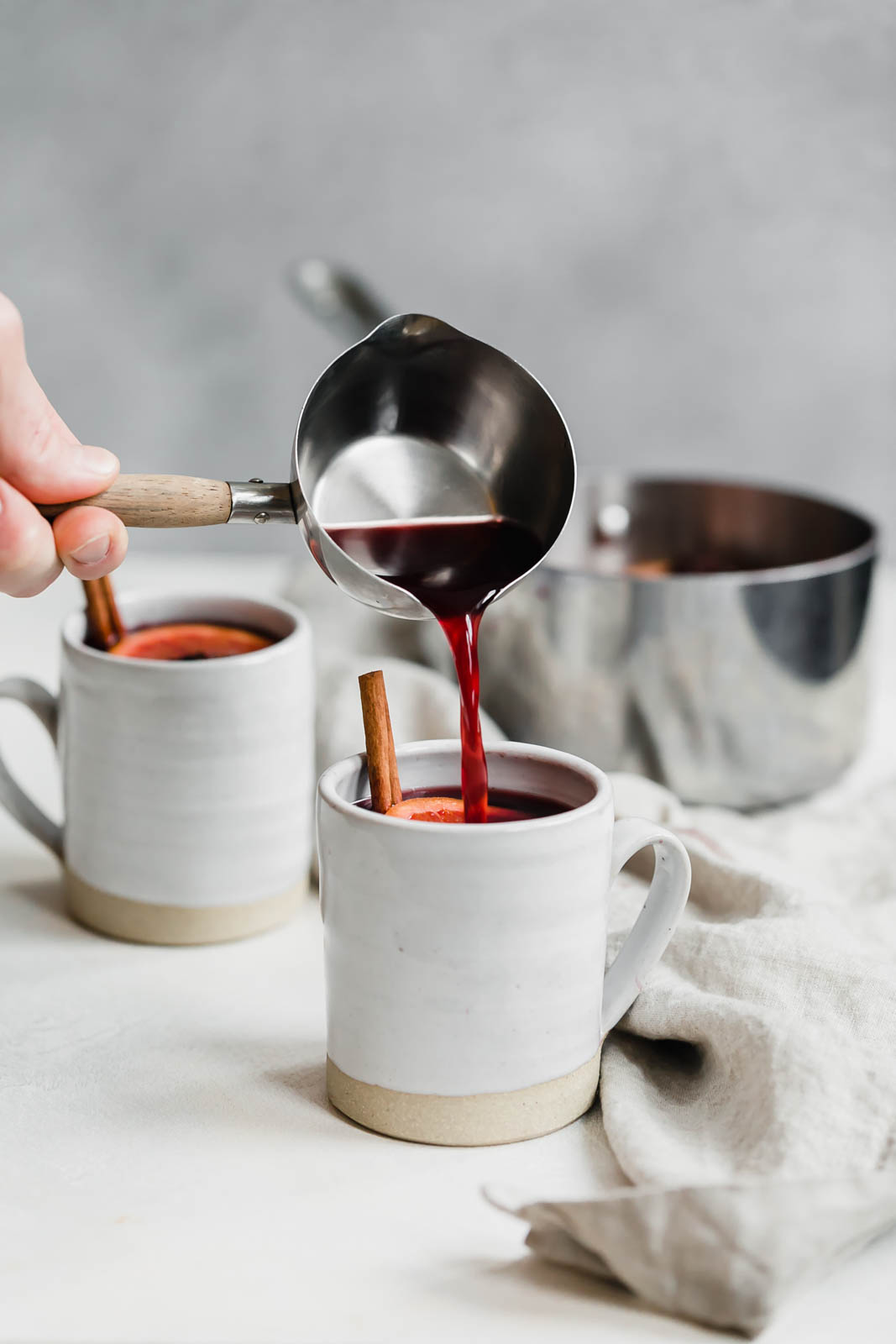simple mulled wine recipe being poured into a mug