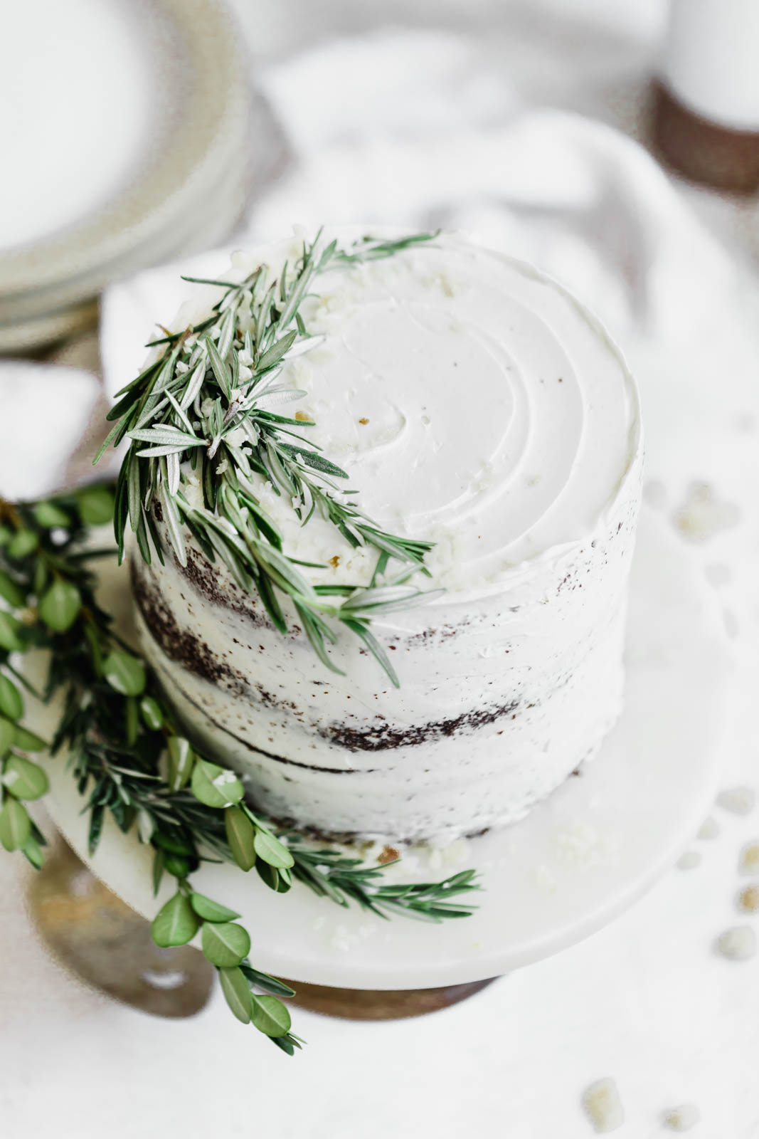 molasses ginger cake with sprigs of rosemary 