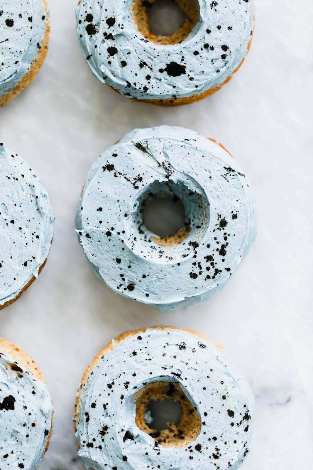 carrot cake donuts on countertop