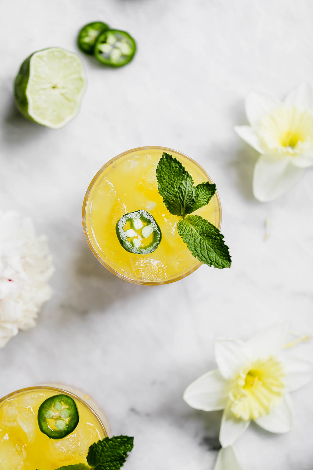 A ridiculously refreshing Spicy Passionfruit Margarita made with a homemade spicy passionfruit syrup, orange liqueur, and tequila