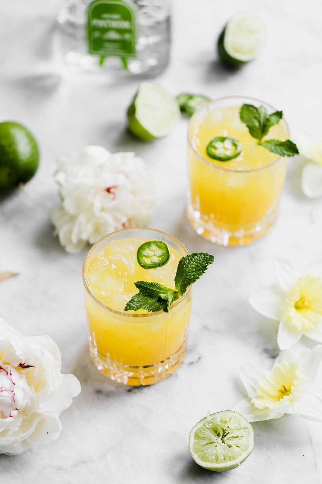 A ridiculously refreshing Spicy Passionfruit Margarita made with a homemade spicy passionfruit syrup, orange liqueur, and tequila