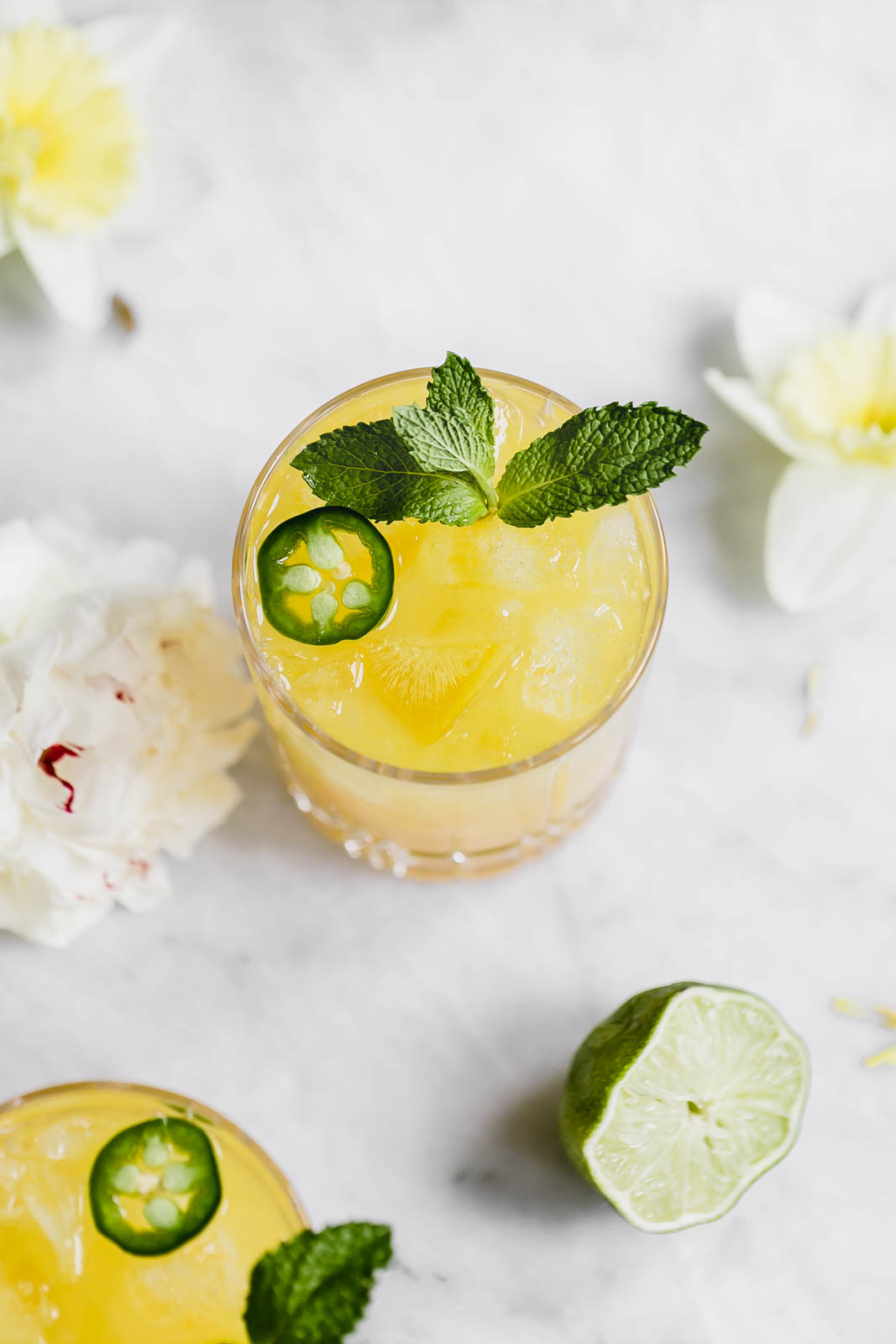 A ridiculously refreshing Spicy Passionfruit Margarita made with a homemade spicy passionfruit syrup, orange liqueur, and tequila