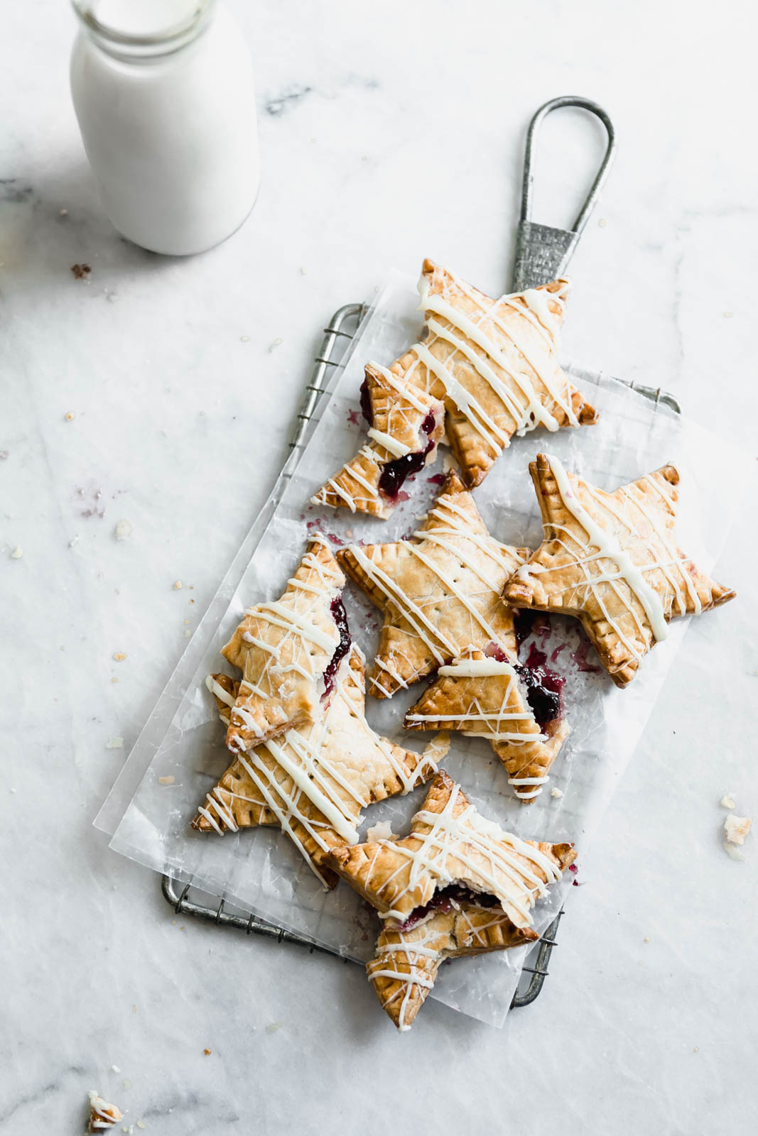 Sometimes, you just want pie. And some of those sometimes, you want pie that fits in your hand. Enter: these White Chocolate Blueberry Star Shaped Hand Pies