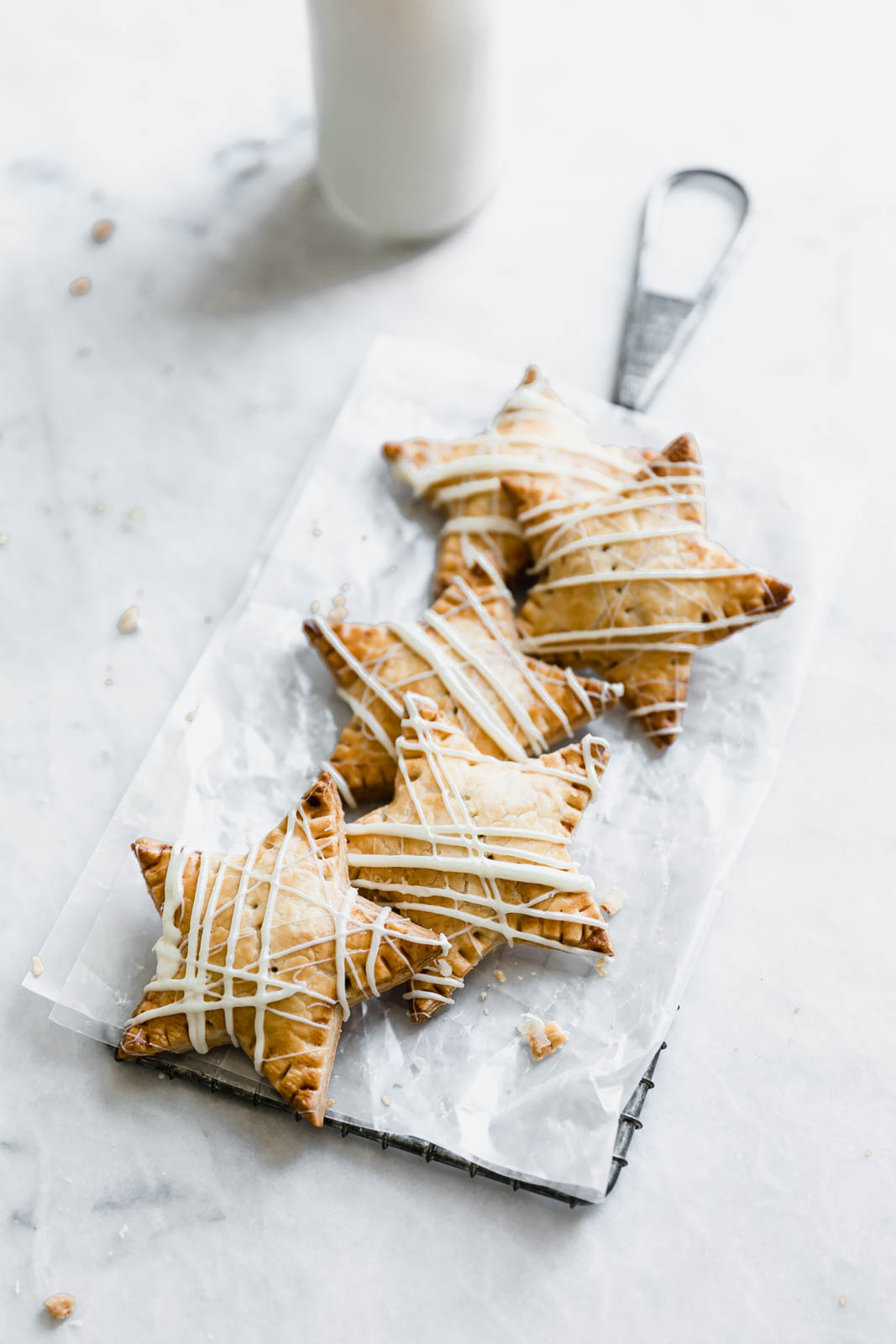 Sometimes, you just want pie. And some of those sometimes, you want pie that fits in your hand. Enter: these White Chocolate Blueberry Star Shaped Hand Pies