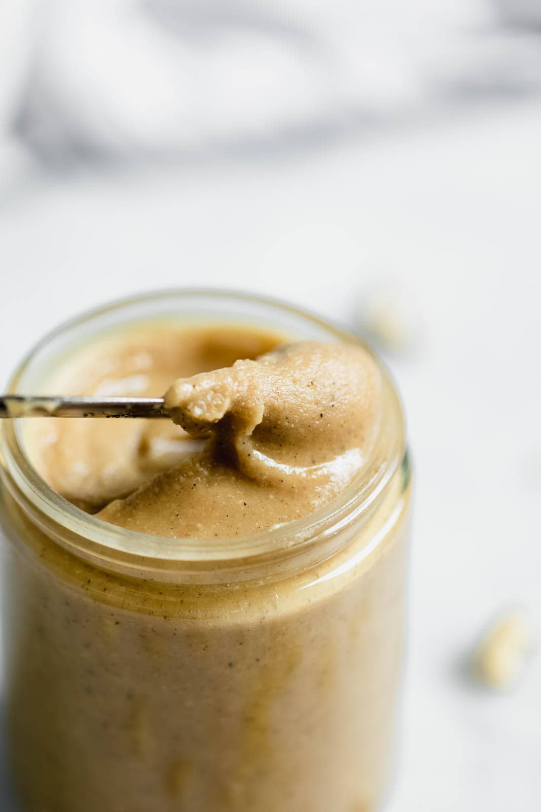 Vanilla Cardamom Cashew Butter being scooped out