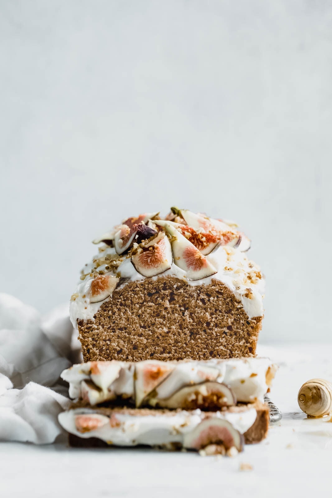 A beautifully simple one bowl honey cake spiced with cinnamon, orange, and black tea, and topped with fresh figs and a goat cheese frosting!