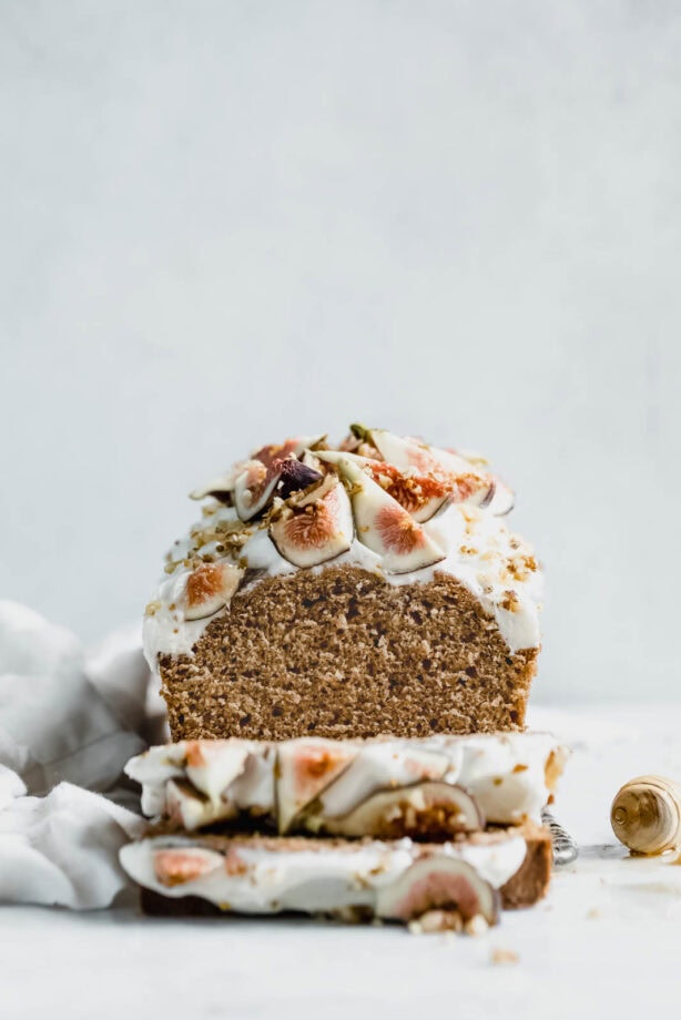 A beautifully simple one bowl honey cake spiced with cinnamon, orange, and black tea, and topped with fresh figs and a goat cheese frosting!