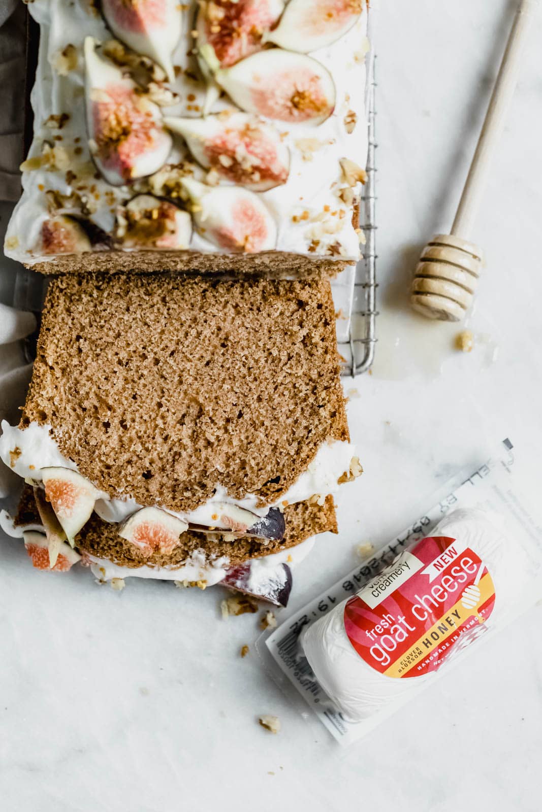 A beautifully simple one bowl honey cake spiced with cinnamon, orange, and black tea, and topped with fresh figs and a goat cheese frosting!