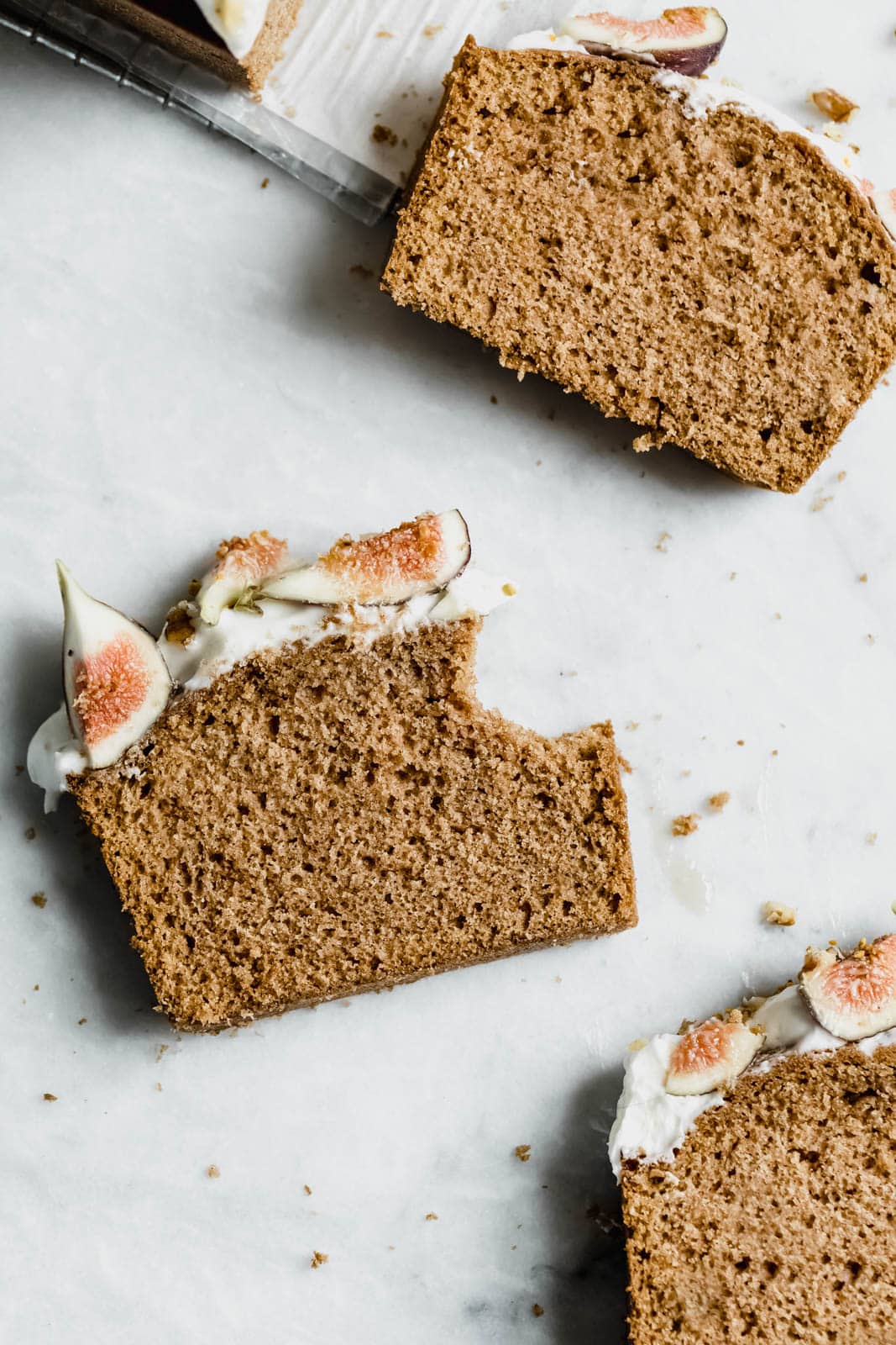 A beautifully simple one bowl honey cake spiced with cinnamon, orange, and black tea, and topped with fresh figs and a goat cheese frosting!
