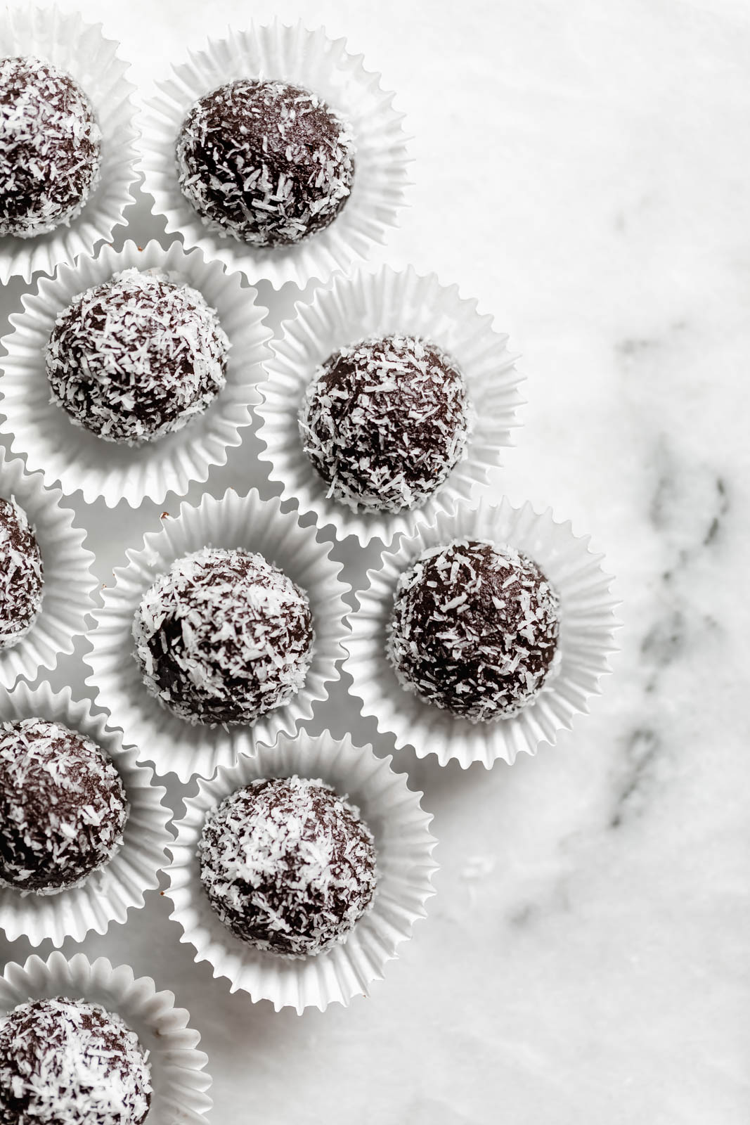 chocolate date balls on countertop