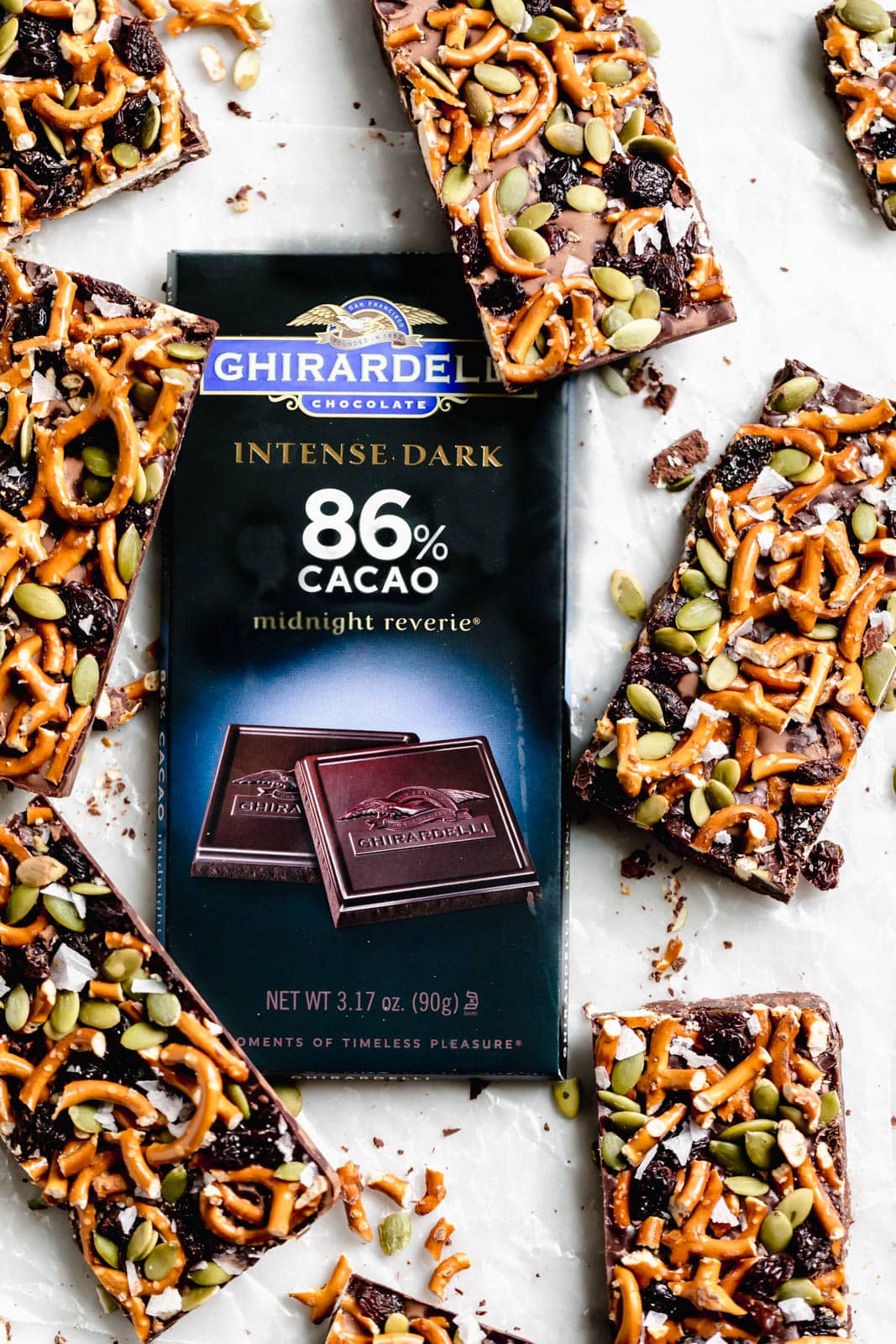 A ridiculously cozy fall dark chocolate bark made with 86% chocolate, pumpkin seeds, pretzels, & dried fruit. Did I mention it's nearly 1/2 inch thick?!