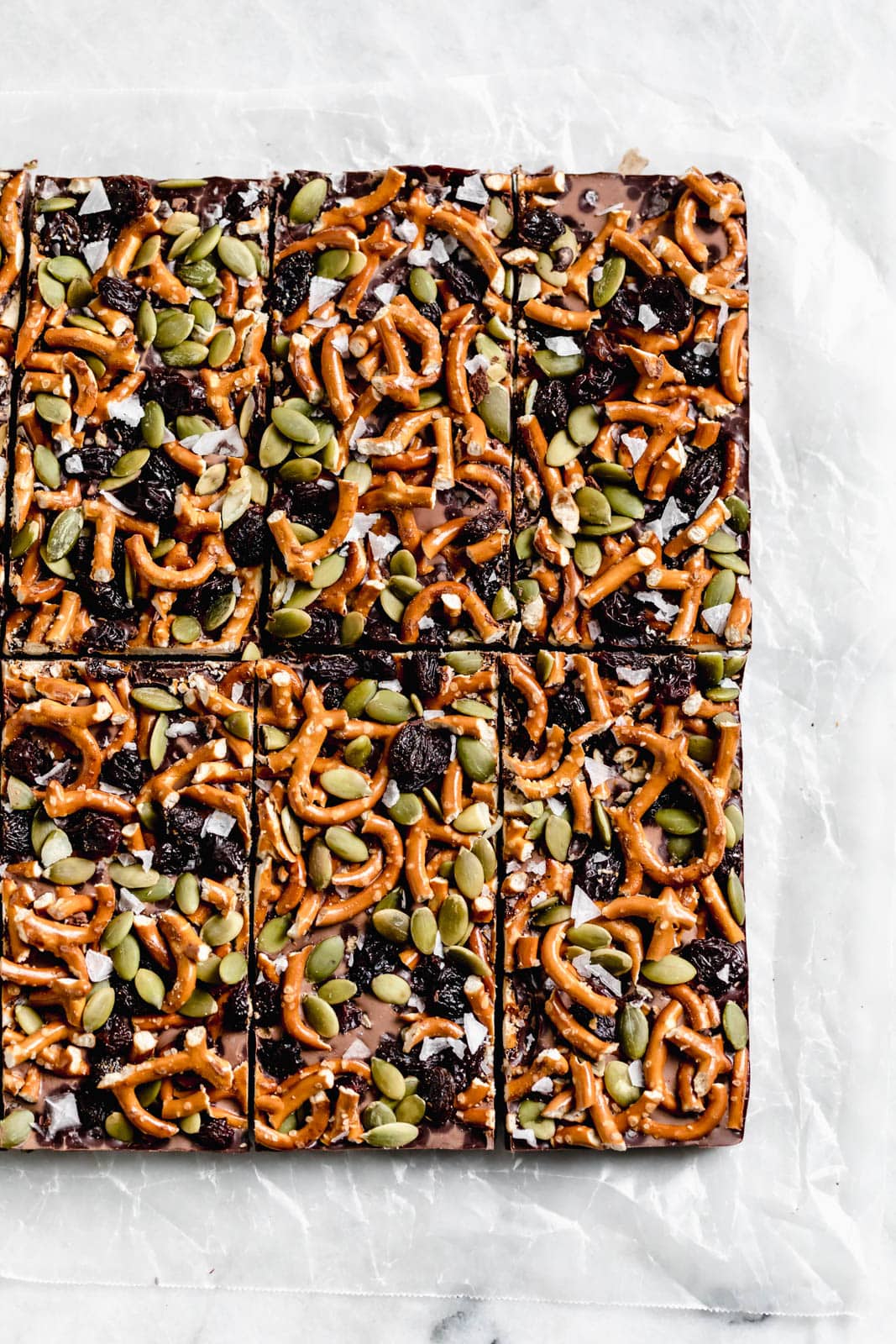 sliced Dark Chocolate Bark with Pumpkin Seeds, Pretzels, and Dried Fruit