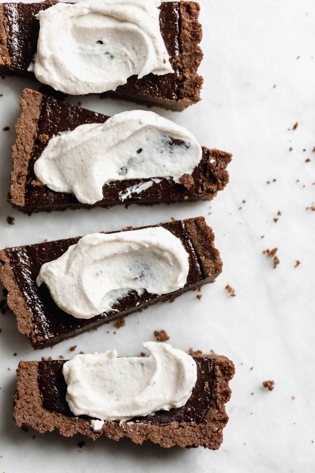 slices of Mocha Chocolate Tart with Crème Fraîche Whipped Cream