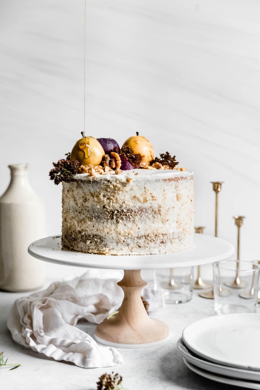 Maple Walnut Cake with Maple Frosting on a cake stand
