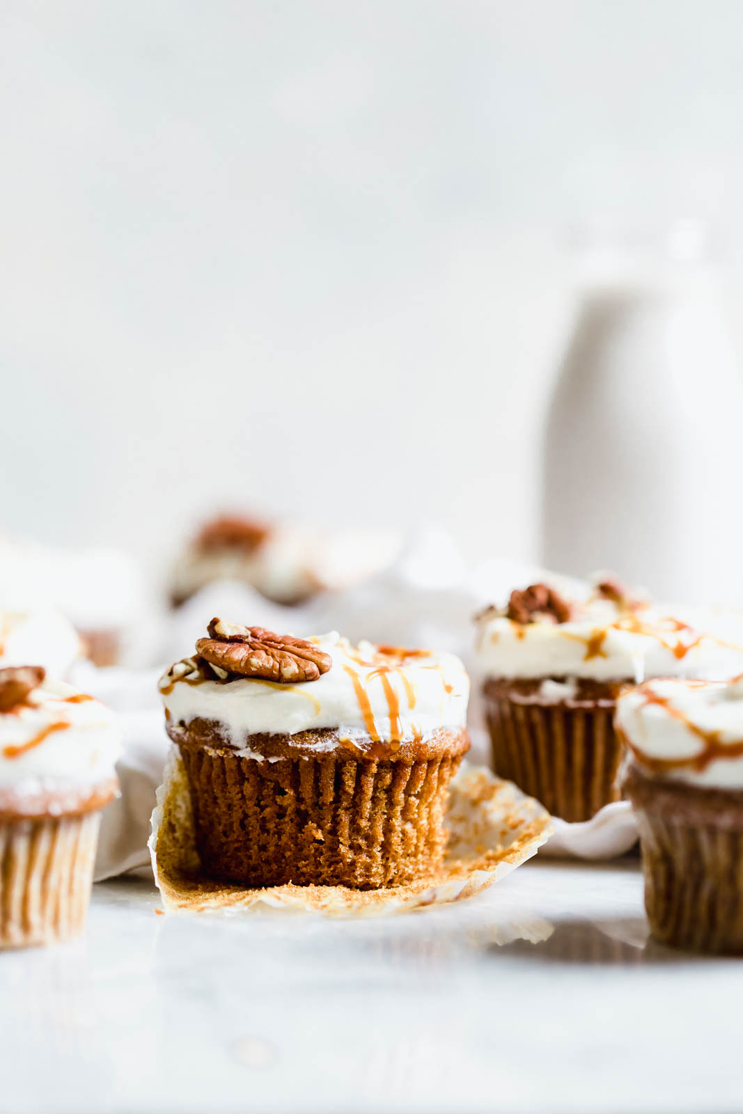 The perfect winter cupcake is here! Sweet potato cupcakes flavored with cinnamon and ginger and topped with a tangy cream cheese frosting.