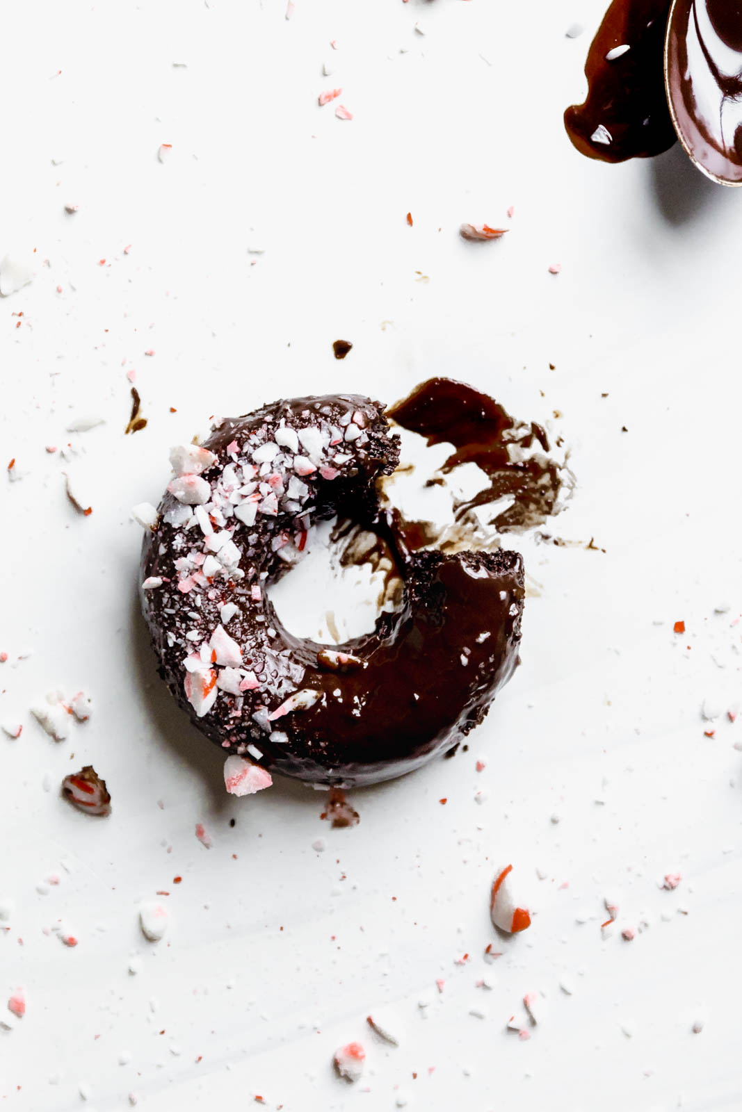 Ultra moist dairy-free and grain-free baked Peppermint Chocolate Donuts made topped with a dark chocolate ganache and candied peppermints. NOM.