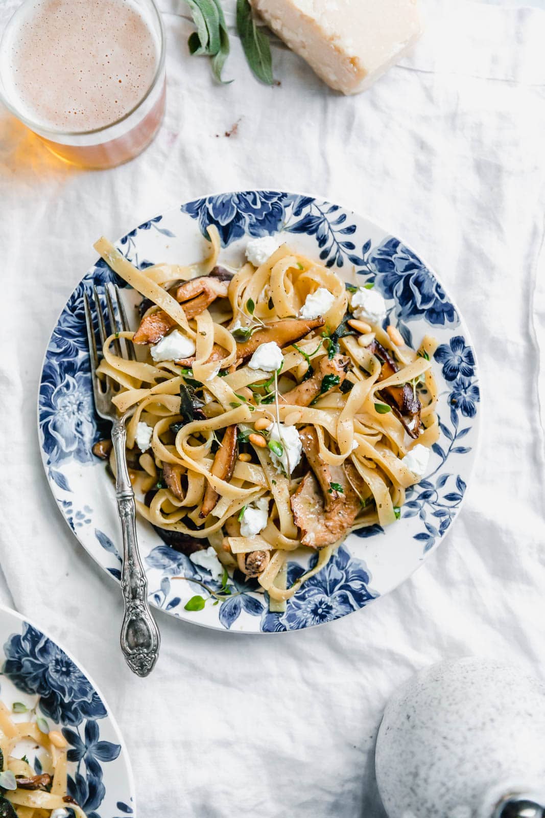 A hearty Herby Mushroom Tagliatelle flavored with brown butter sage shiitakes, toasted pinenuts, and goat cheese. Get in my belly. Stat.