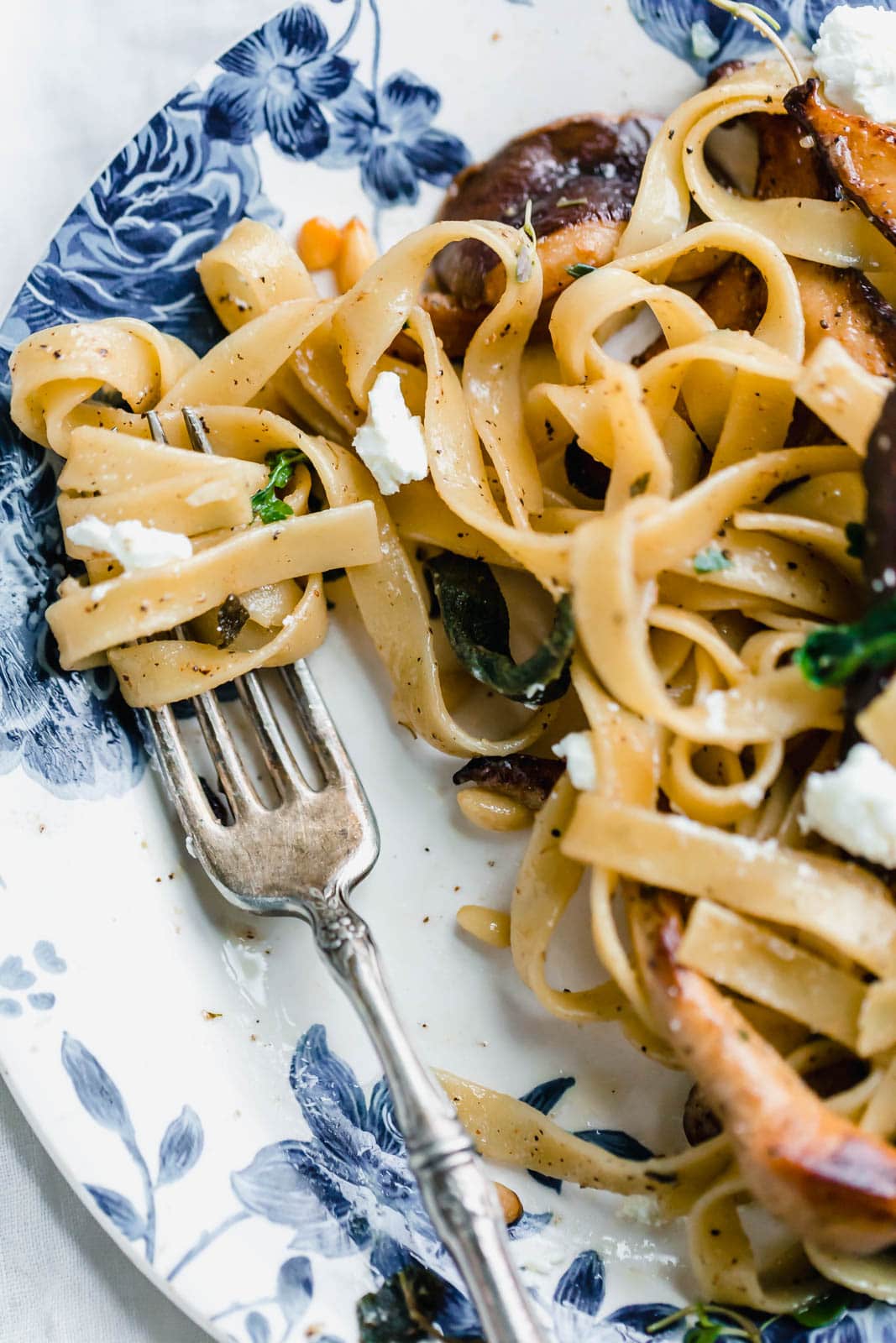A hearty Herby Mushroom Tagliatelle flavored with brown butter sage shiitakes, toasted pinenuts, and goat cheese. Get in my belly. Stat.