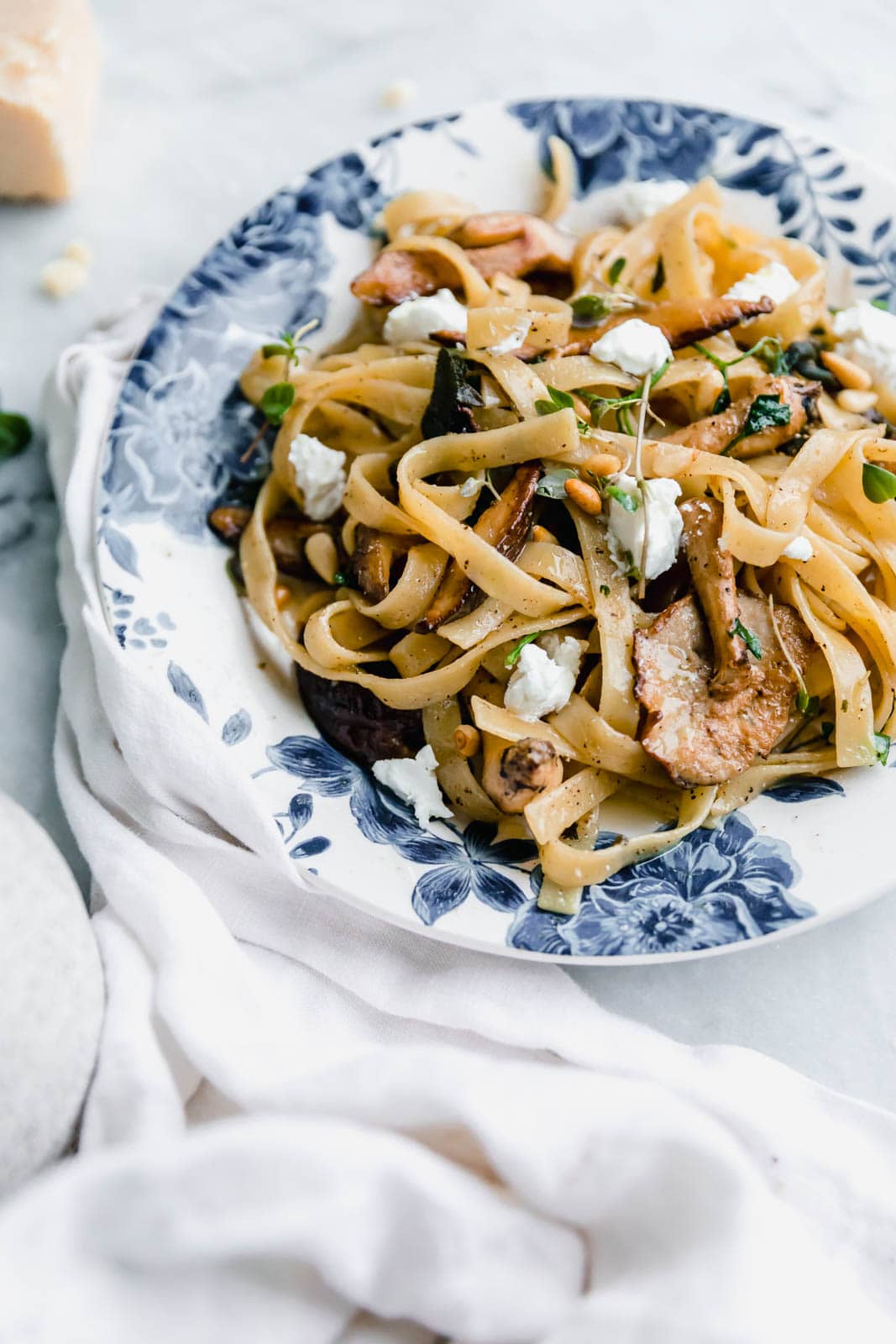 A hearty Herby Mushroom Tagliatelle flavored with brown butter sage shiitakes, toasted pinenuts, and goat cheese. Get in my belly. Stat.