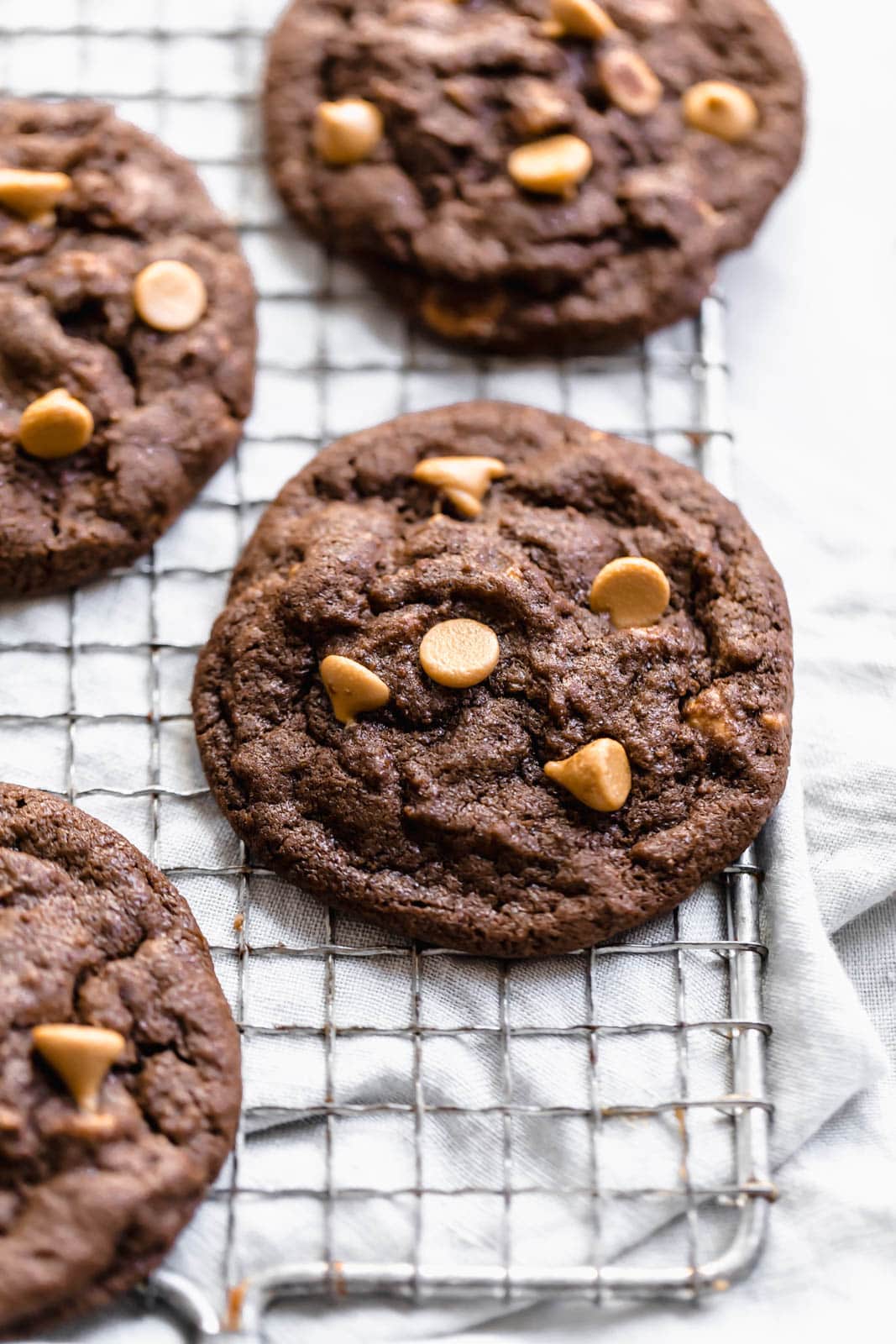  Chocolate Peanut Butter Chip Cookies on wire rack