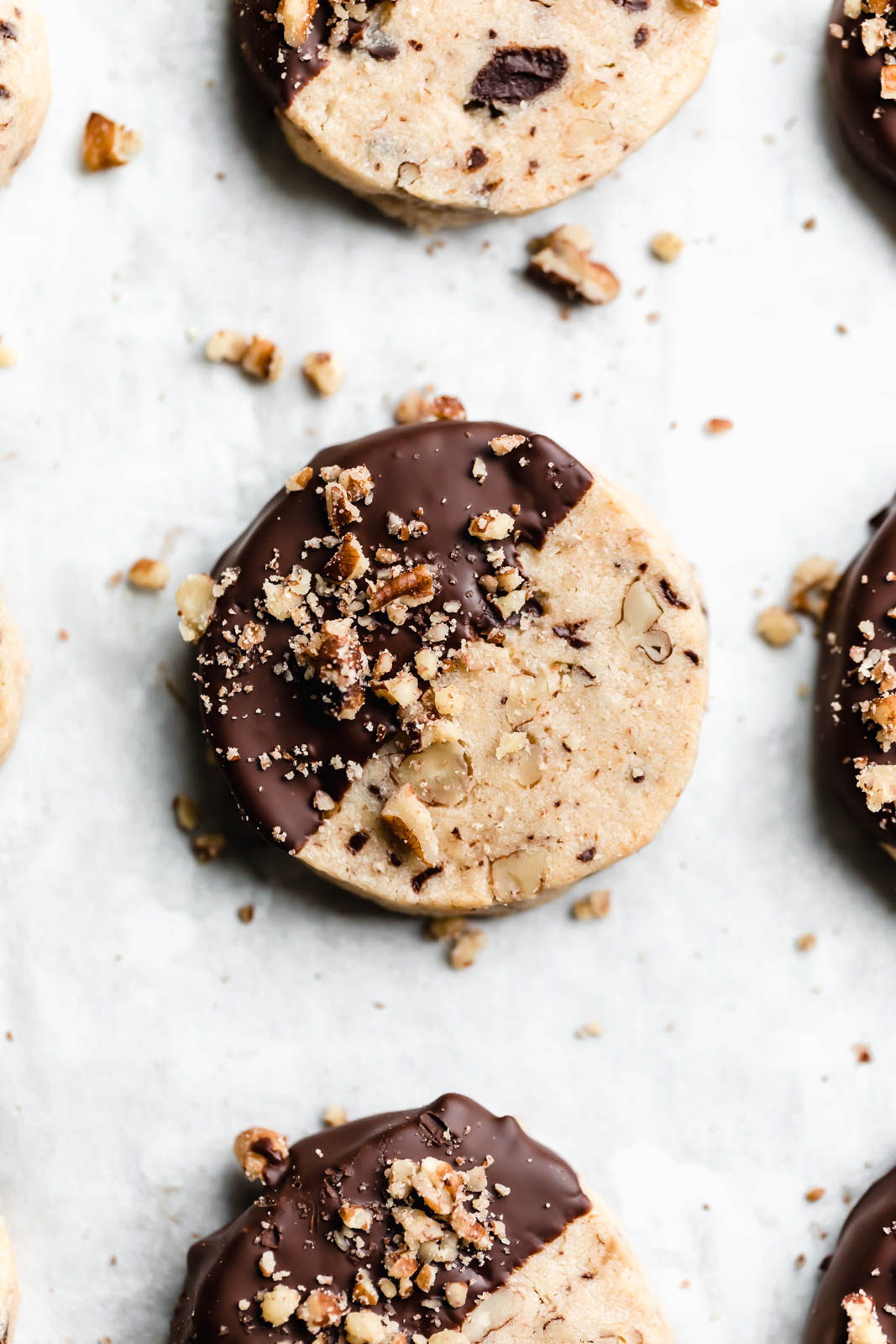 Buttery, shortbready, and yet somehow totally moist, these Pecan Chocolate Chip Slice and Bake Cookies are my new go-to holiday cookie!