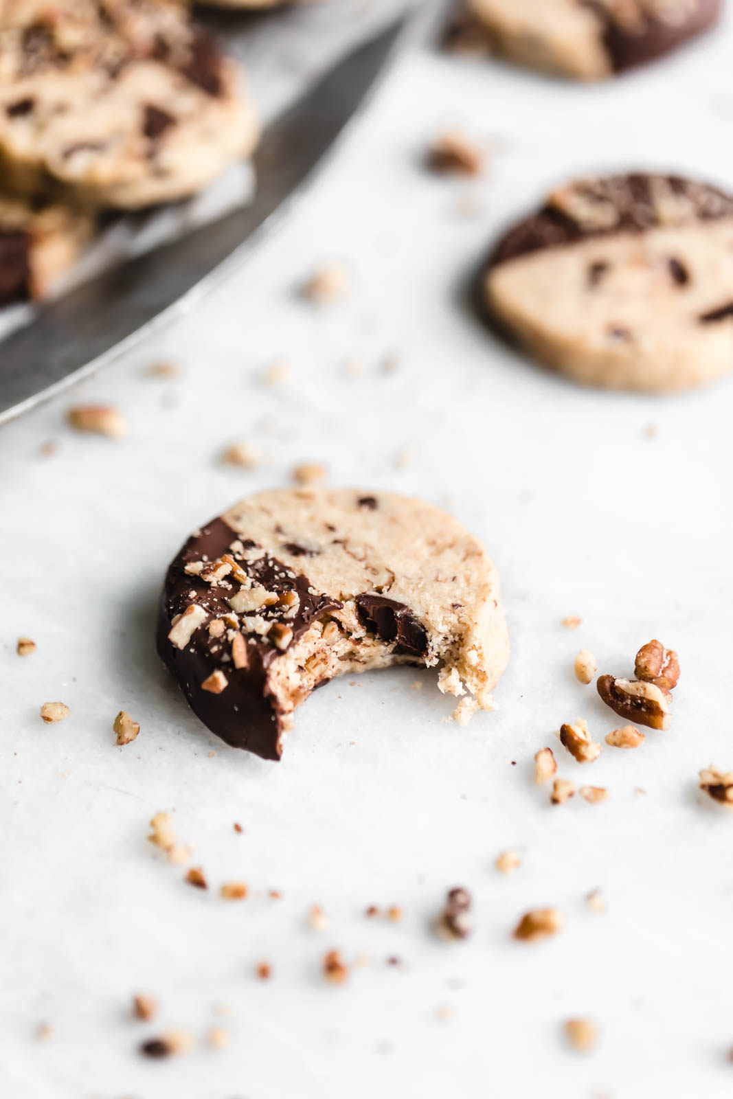 Buttery, shortbready, and yet somehow totally moist, these Pecan Chocolate Chip Slice and Bake Cookies are my new go-to holiday cookie!