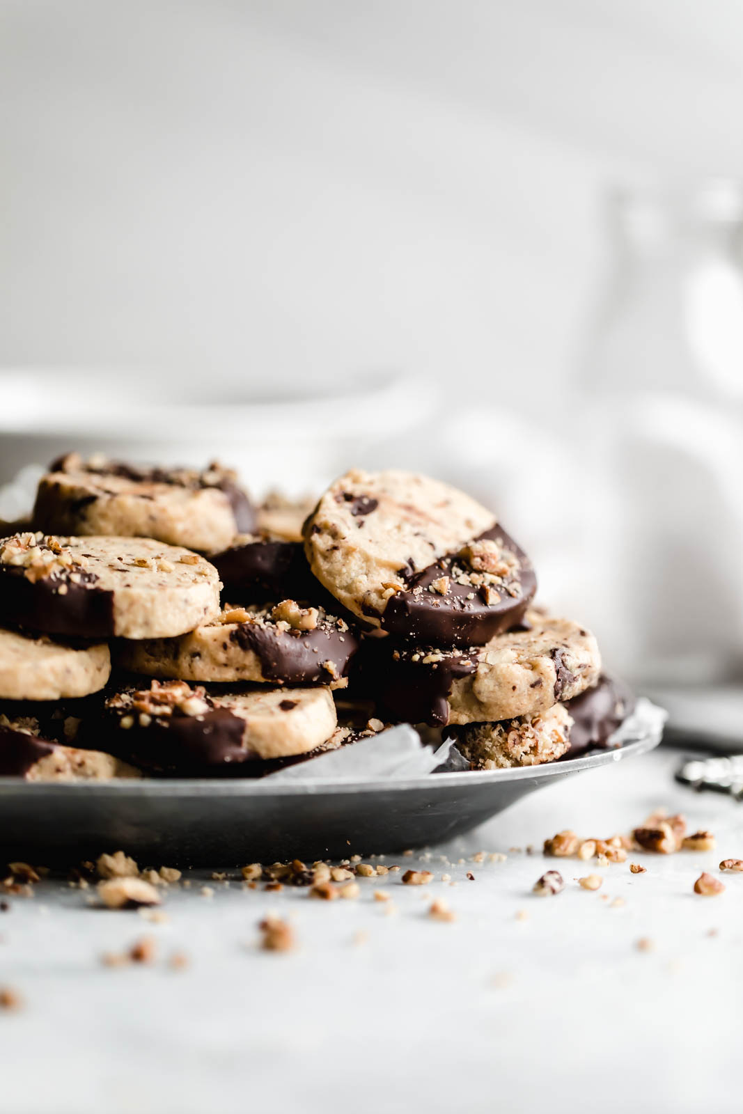 Buttery, shortbready, and yet somehow totally moist, these Pecan Chocolate Chip Slice and Bake Cookies are my new go-to holiday cookie!