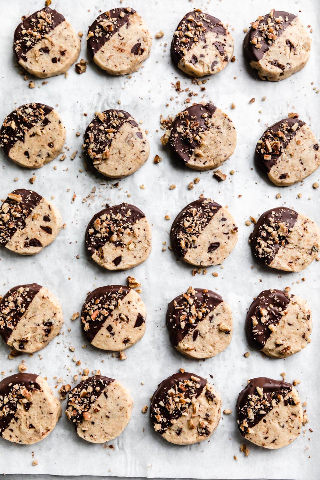 Buttery, shortbready, and yet somehow totally moist, these Pecan Chocolate Chip Slice and Bake Cookies are my new go-to holiday cookie!