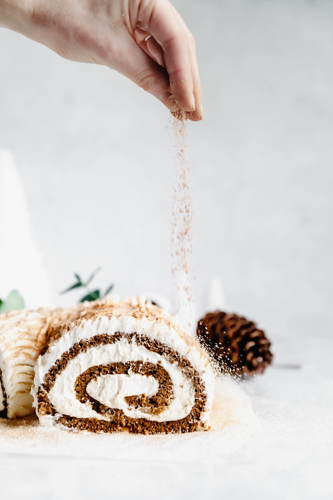 This festive White Chocolate Gingerbread Yule Log is a showstopper Christmas dessert. Made with white chocolate buttercream "bark" for that rustic look!