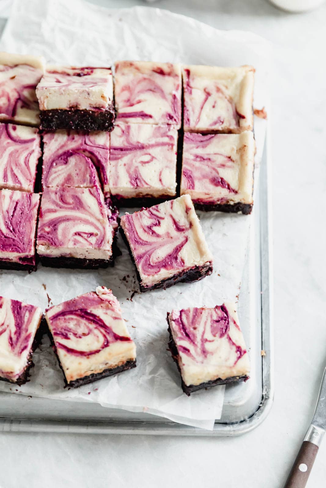Rich fudge brownies topped with creamy cheesecake and a sinful black cherry swirl. Easy to make and even easier to devour.