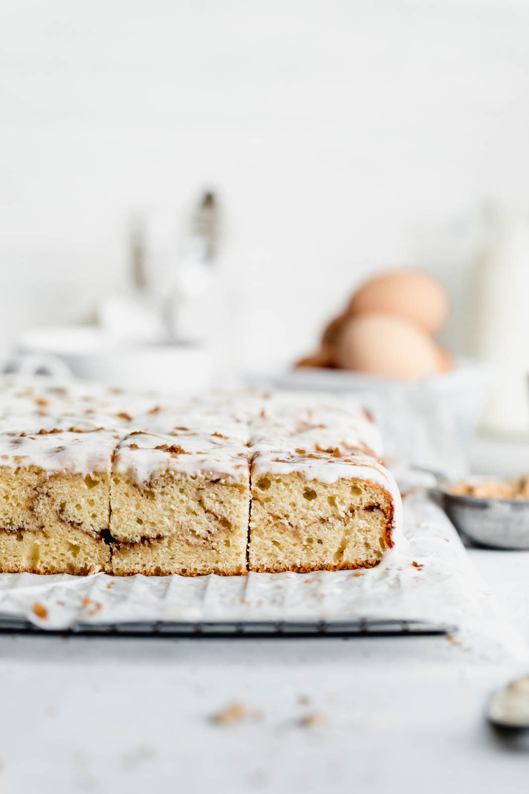 Buttery cinnamon roll cake swirled with ribbons of cinnamon and topped with a cream cheese glaze. All the decadence of a Cinnabon in half the time.