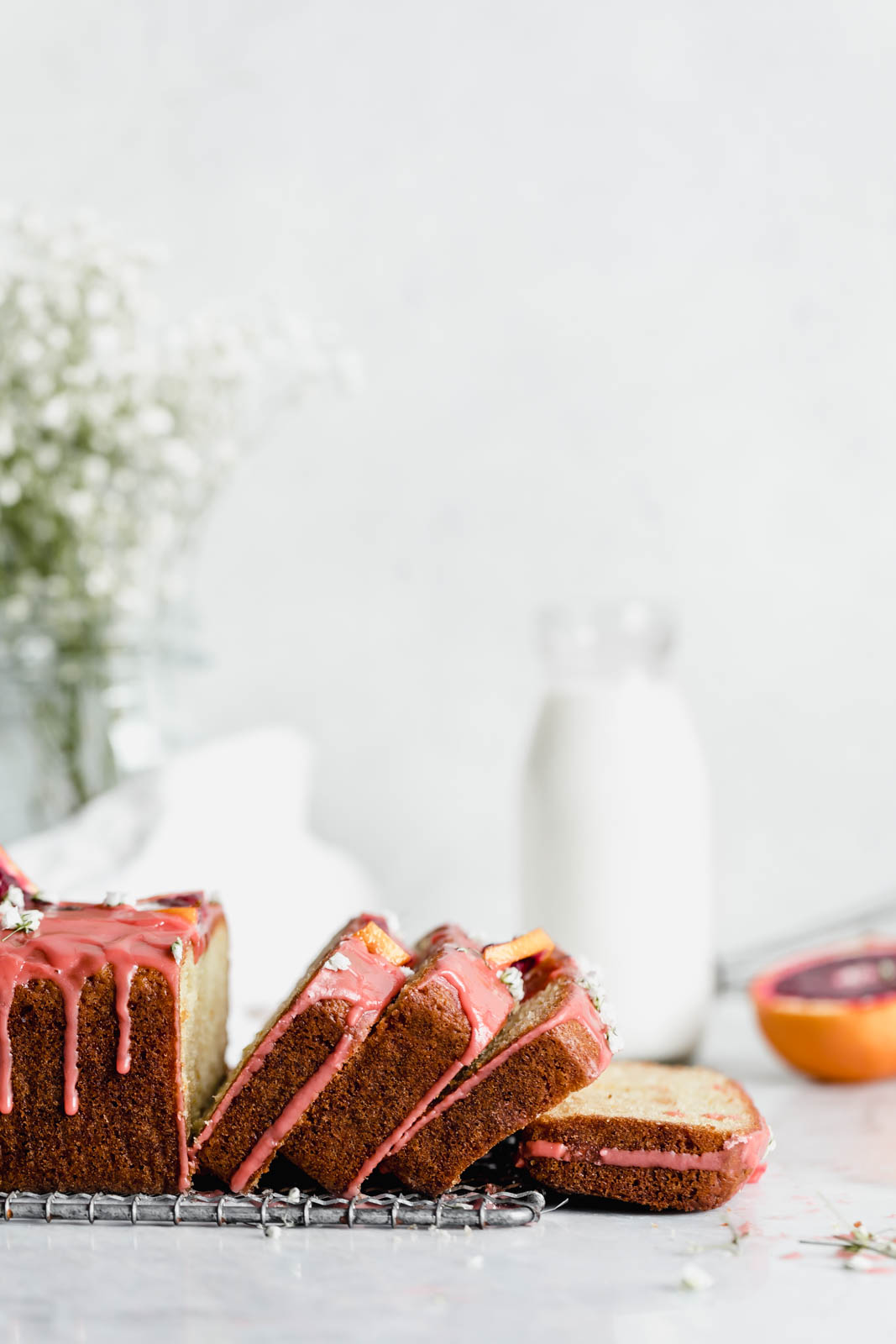 Celebrate citrus season with this beautiful blood orange loaf cake made with greek yogurt and topped with the perfect tangy pink glaze.
