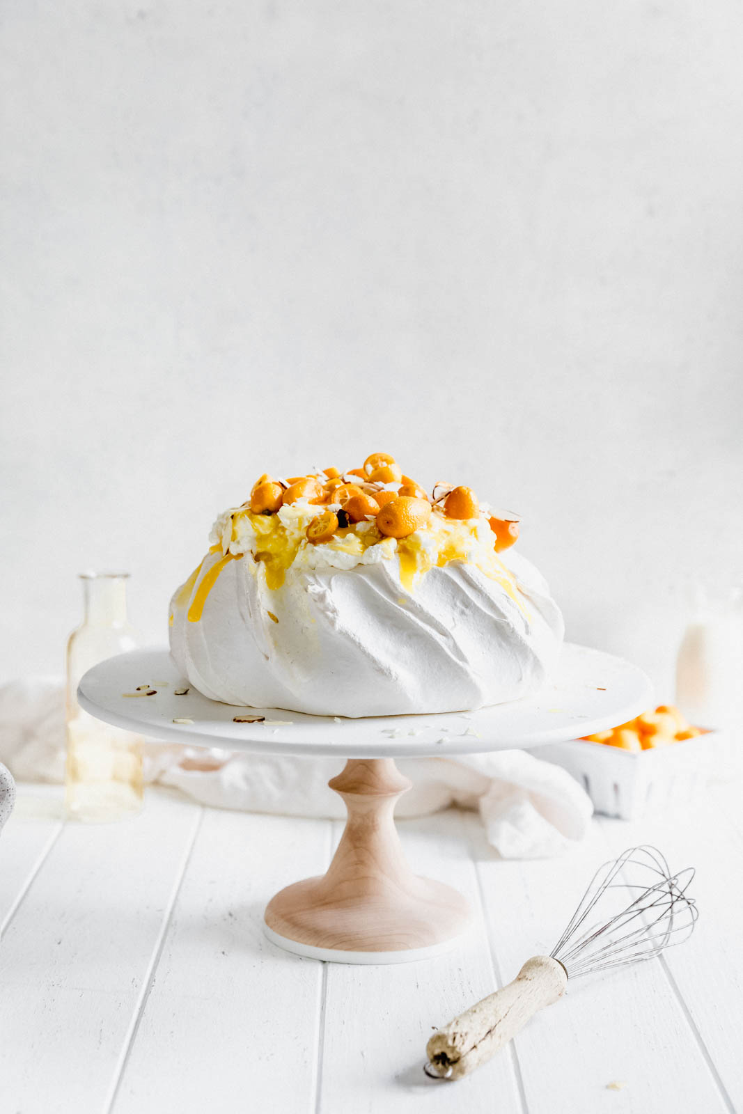 Make everyone say HUBBA HUBBA with this showstopping white chocolate and lemon curd pavlova topped with baby kumquats and sliced almonds. 