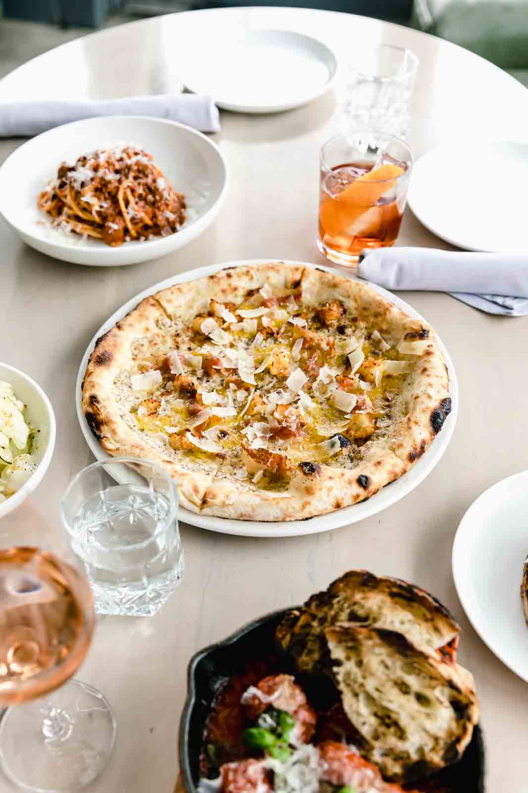 A modern and bright Restaurant Engagement Photo Shoot in downtown Toronto