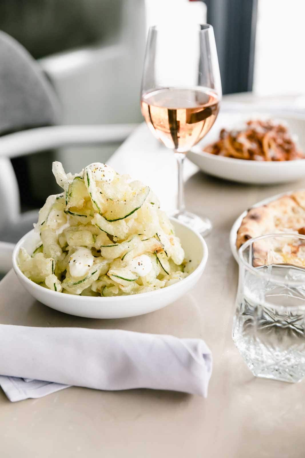 A modern and bright Restaurant Engagement Photo Shoot in downtown Toronto