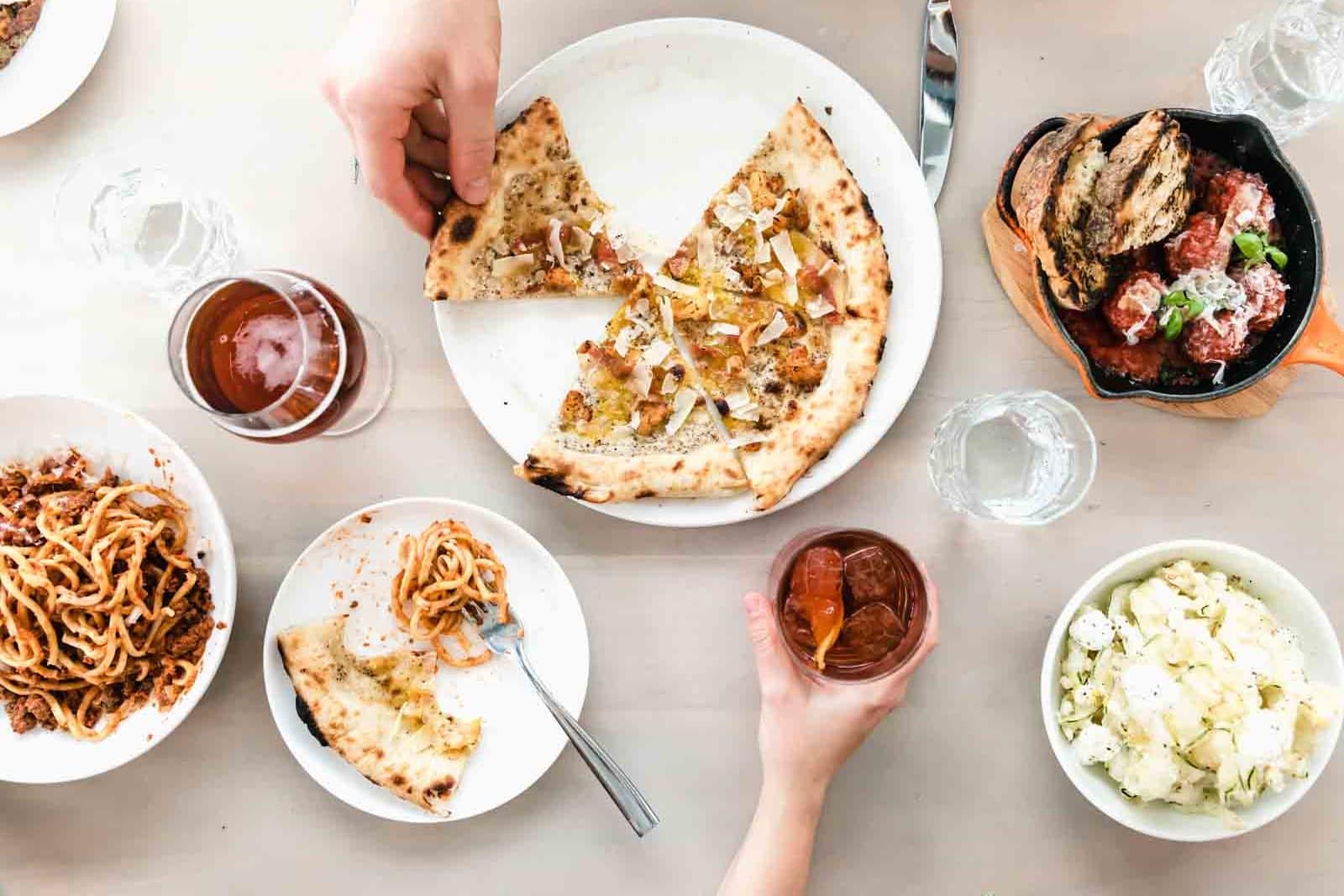 A modern and bright Restaurant Engagement Photo Shoot in downtown Toronto