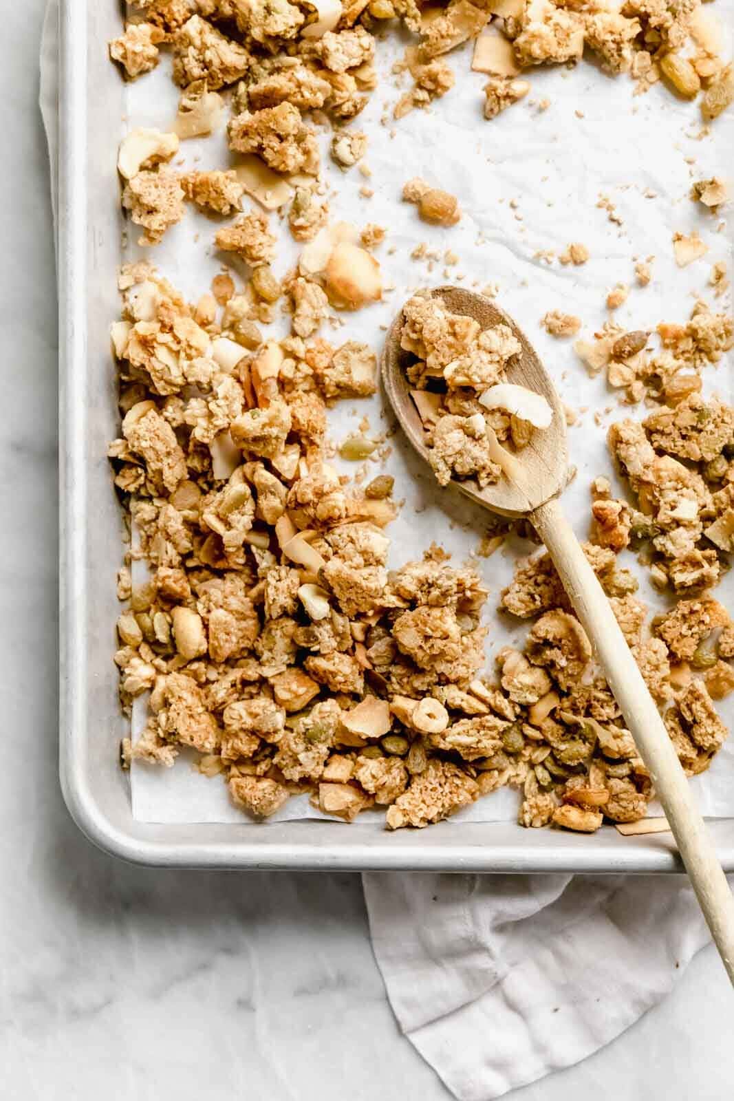 Golden Granola AKA coconut, cashew, olive oil granola wtih golden raisins (our fav) is perfectly salty and sweet. Delicious with yogurt or by the handful and super easy to make!