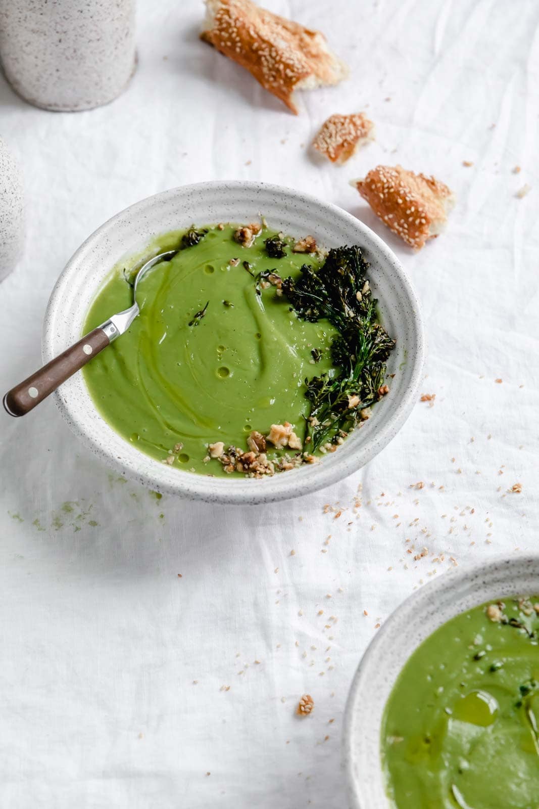 1 ingredient broccoli soup in bowls with bread