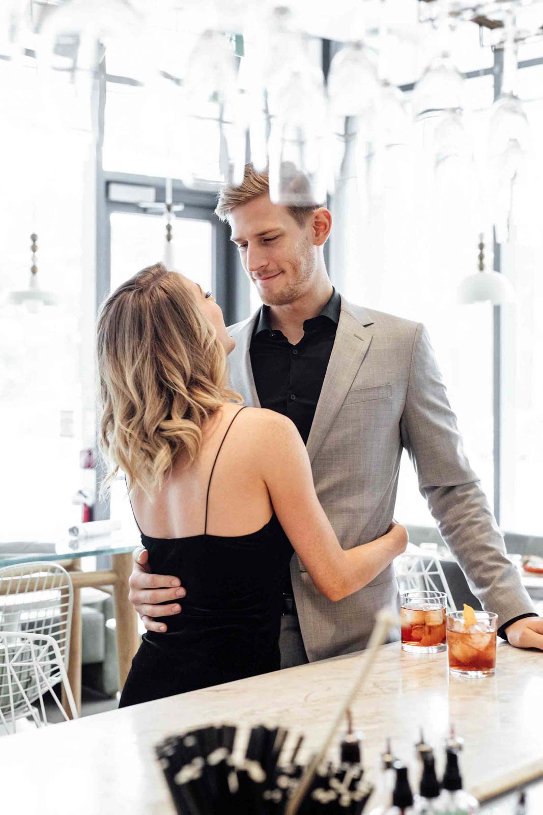 A modern and bright Restaurant Engagement Photo Shoot in downtown Toronto