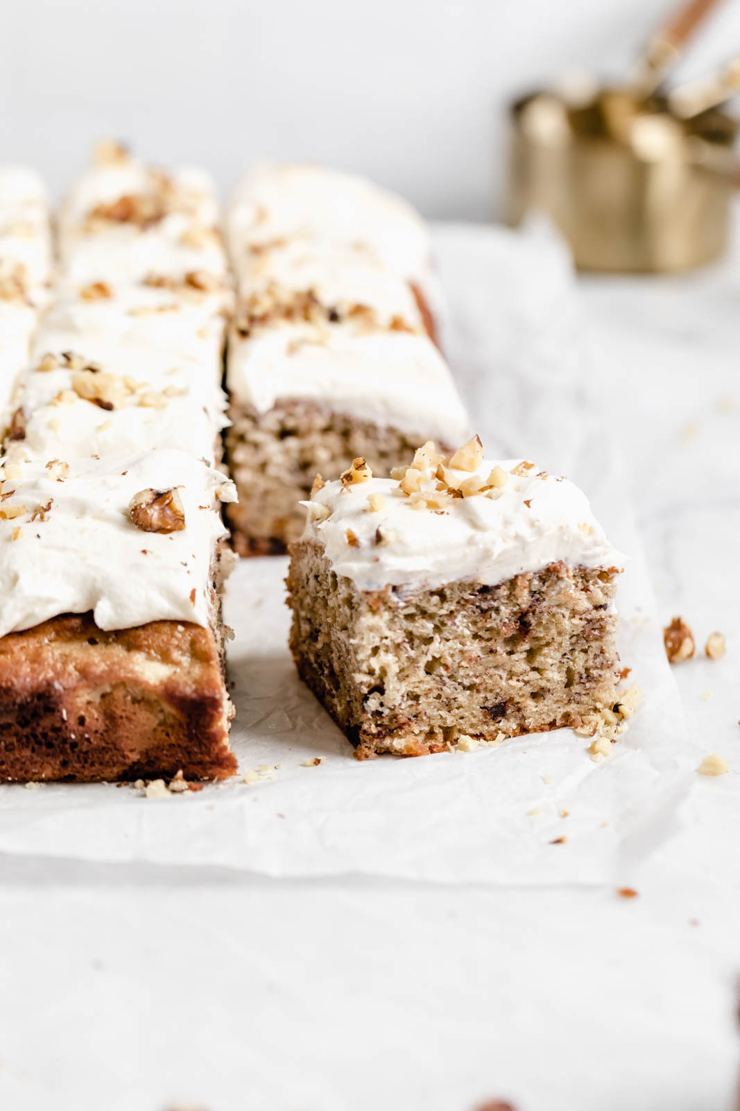 Fluffy and moist brown butter banana cake with cream cheese frosting. YUM.