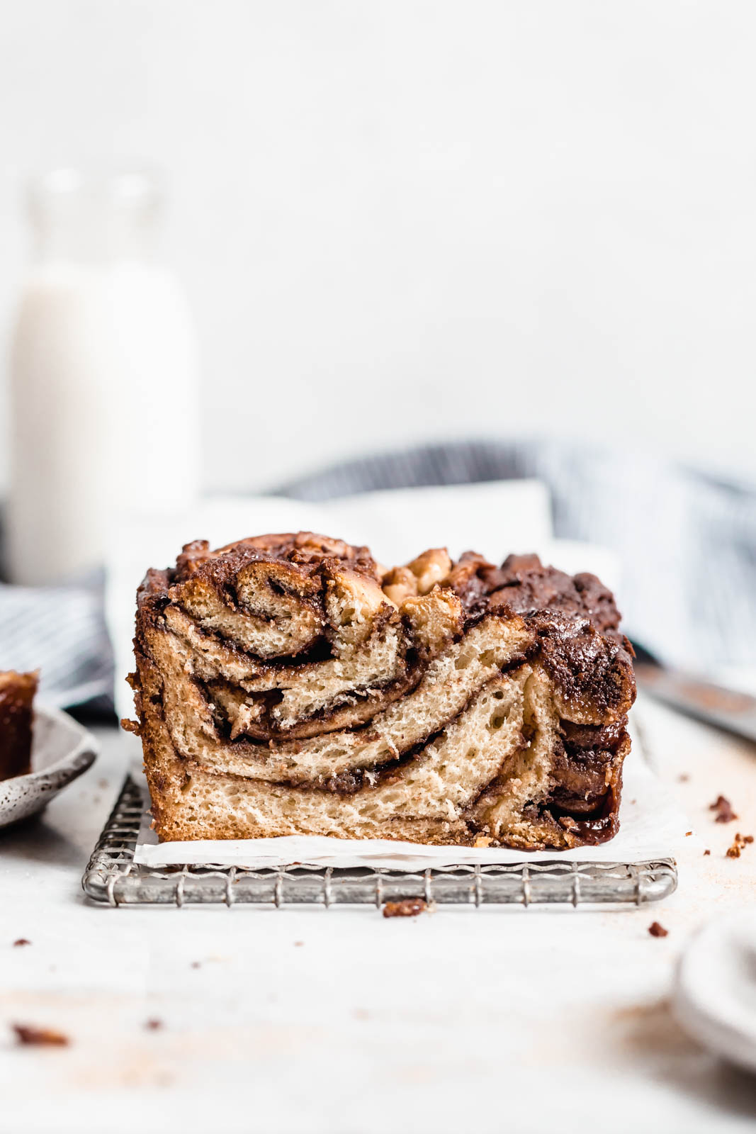 Buttery, flaky dough swirled together with cinnamon AND chocolate make this stunning Cinnamon Chocolate Babka. Step by step instructions on how to make the perfect babka!