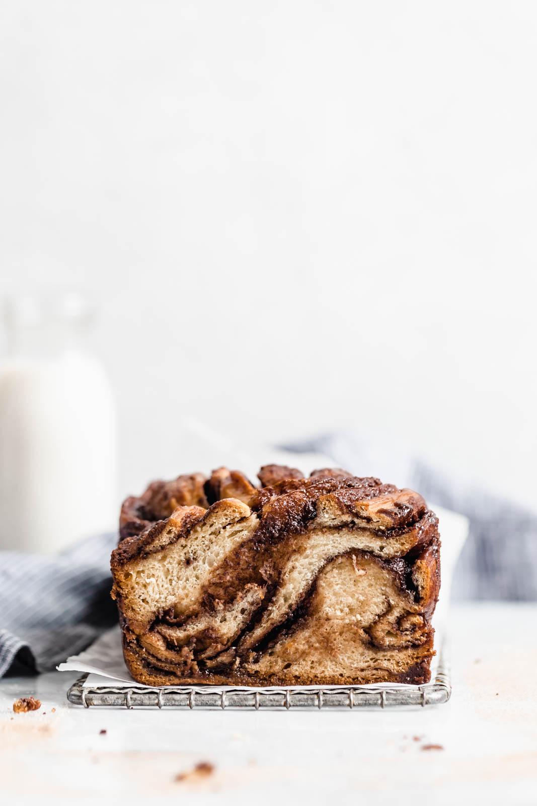 Buttery, flaky dough swirled together with cinnamon AND chocolate make this stunning Cinnamon Chocolate Babka. Step by step instructions on how to make the perfect babka!