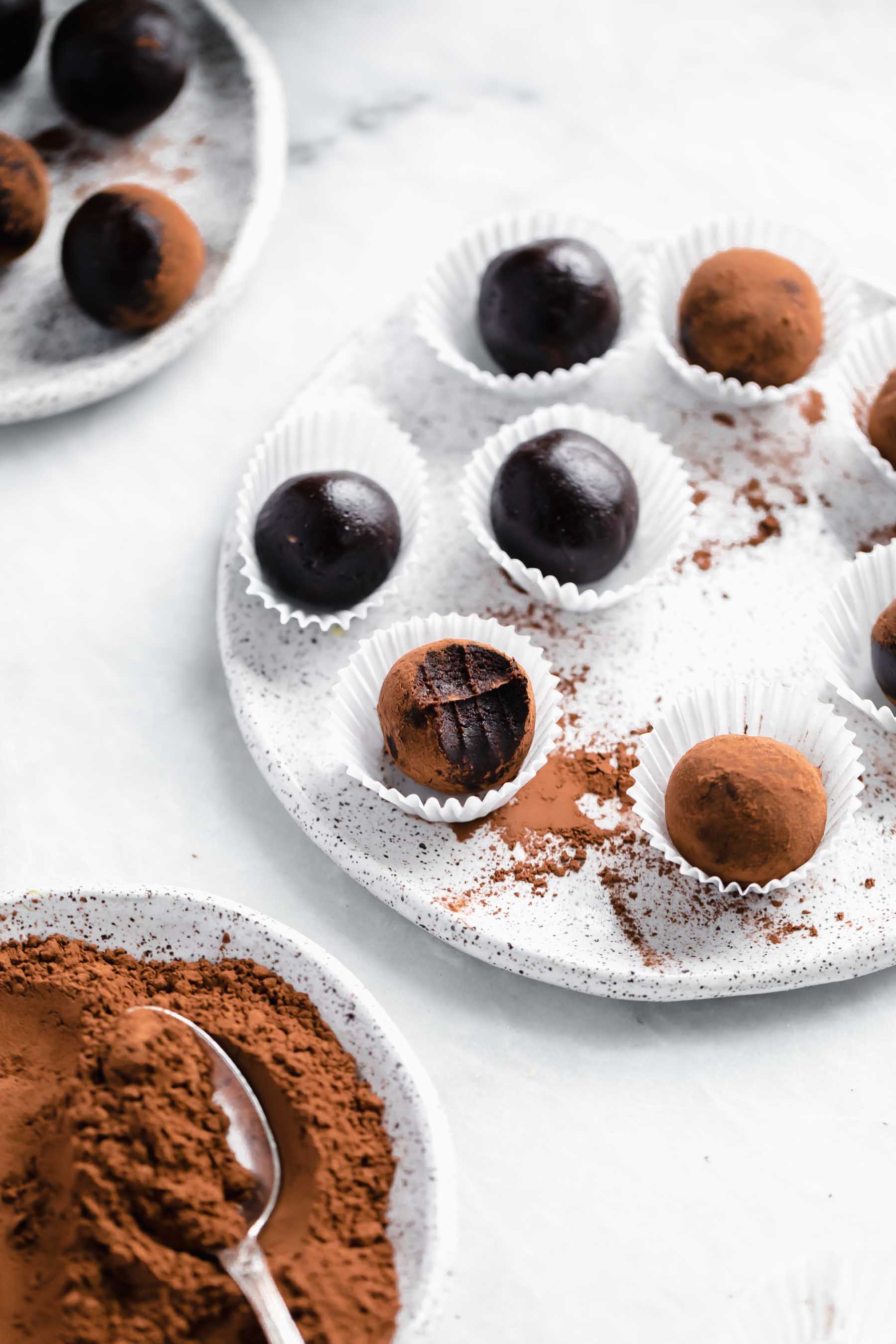 You'd never know these fudgy healthy vegan brownies truffles are raw, refined sugar free, AND gluten free. They're a chocolate lovers dream.