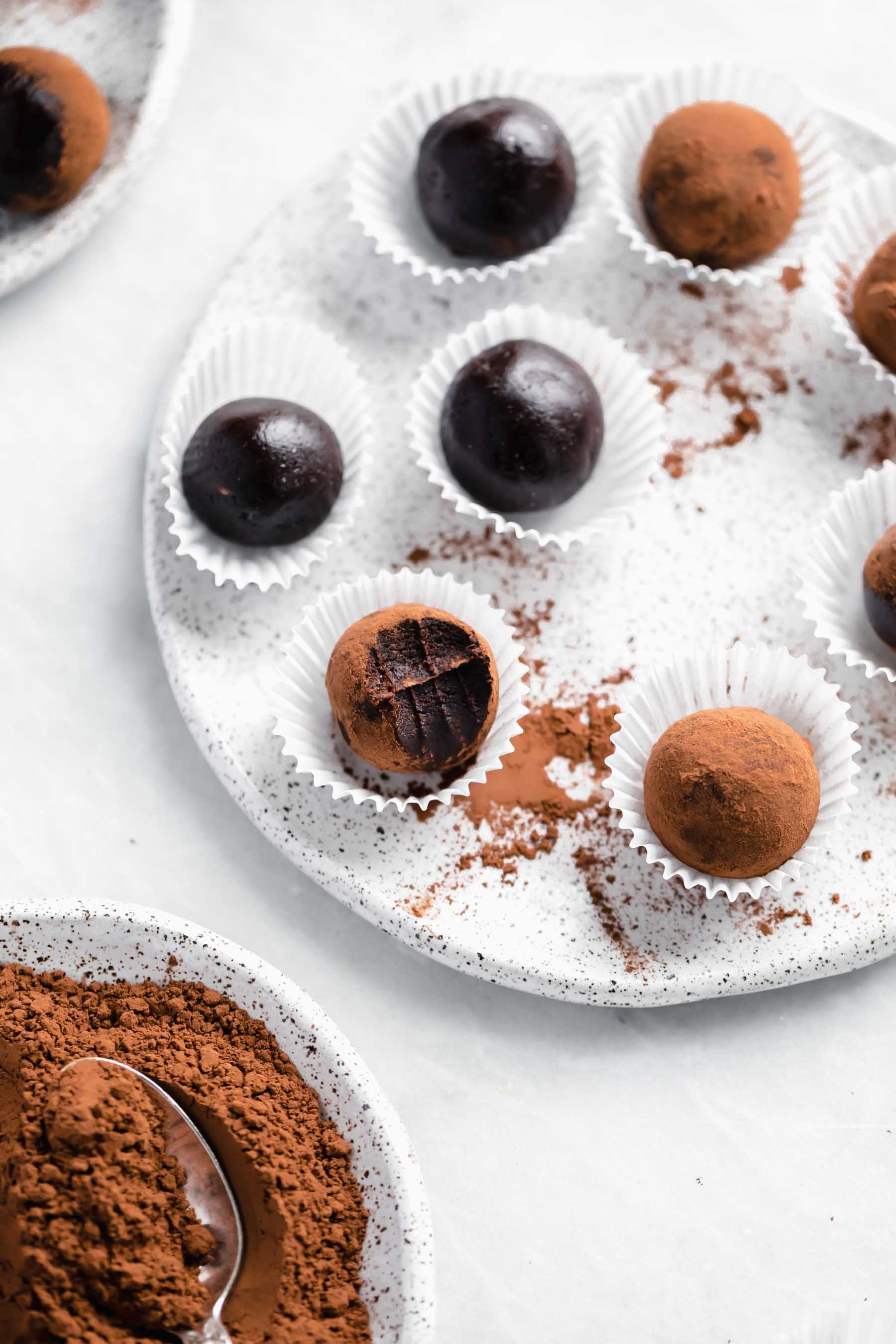 You'd never know these fudgy healthy vegan brownies truffles are raw, refined sugar free, AND gluten free. They're a chocolate lovers dream.